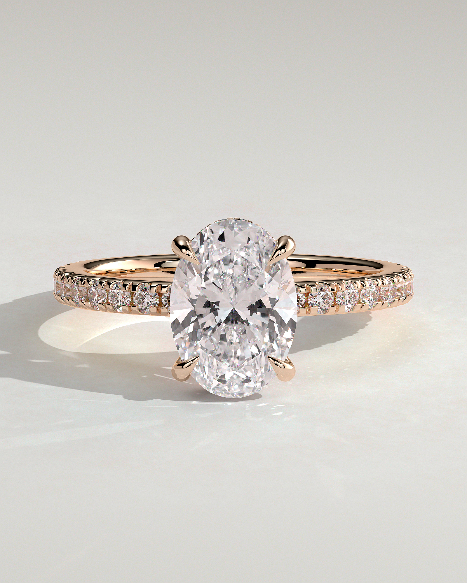 Oval 4 Claw Solitaire with Wrap Around Hidden Halo and Pave Band Engagement Ring - 18k Rose Gold