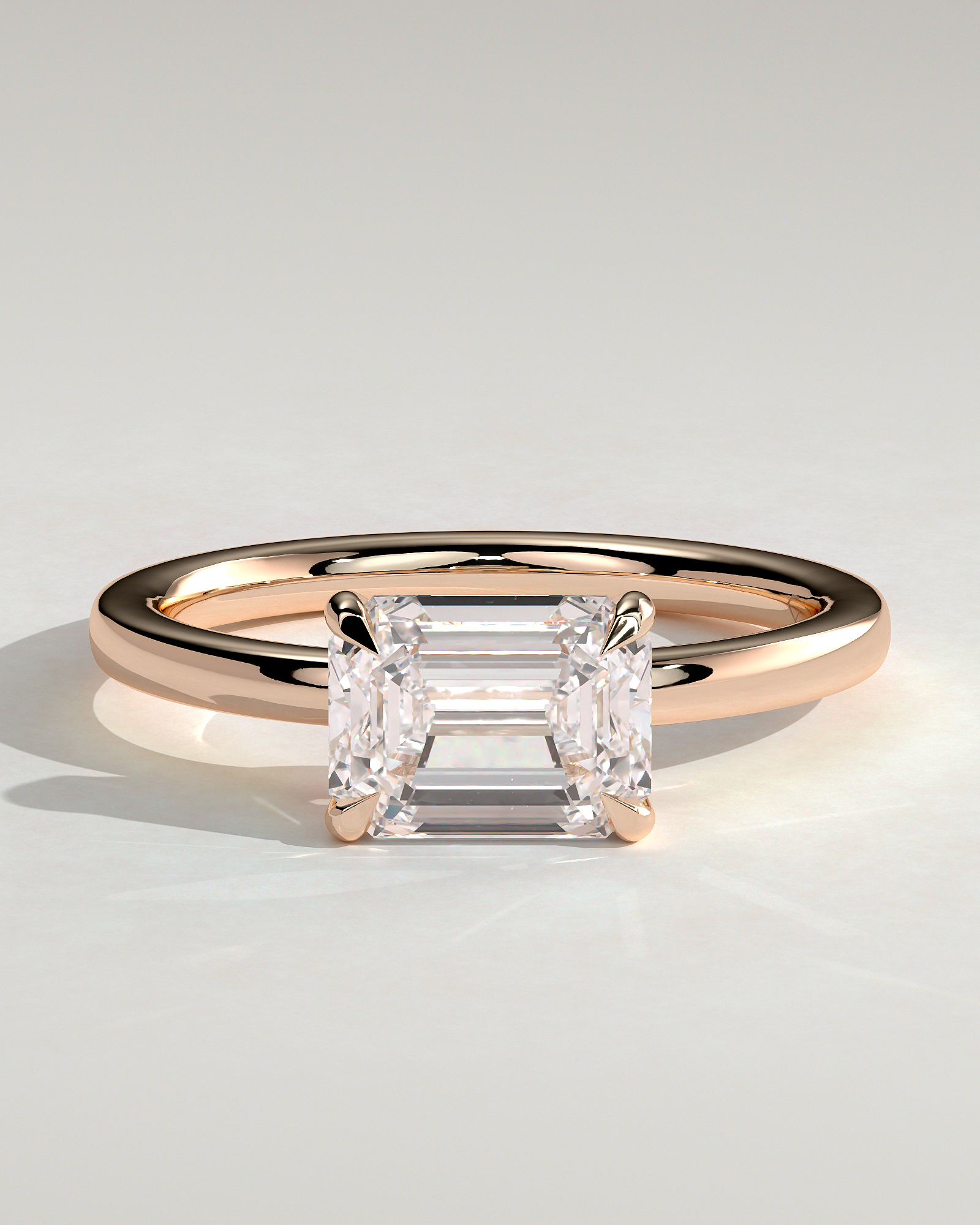Evelyn  East West Emerald Solitaire - 18k Rose Gold