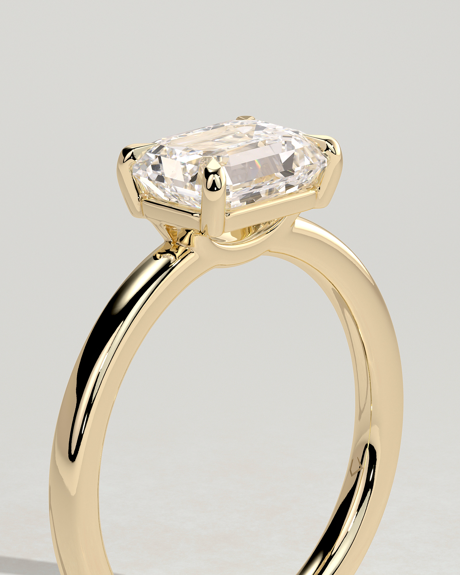 Evelyn  East West Emerald Solitaire - 18k Yellow Gold