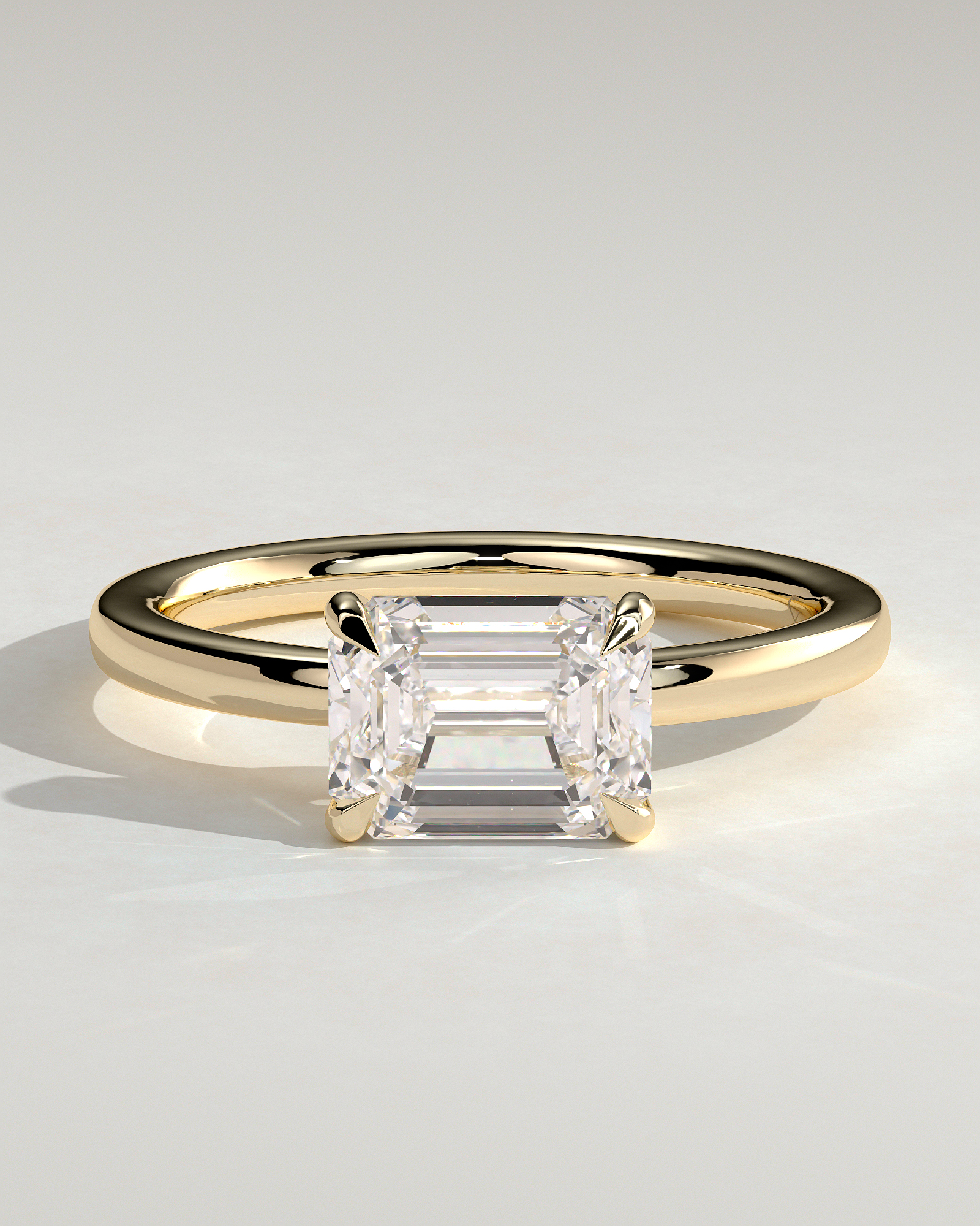 Evelyn  East West Emerald Solitaire - 18k Yellow Gold