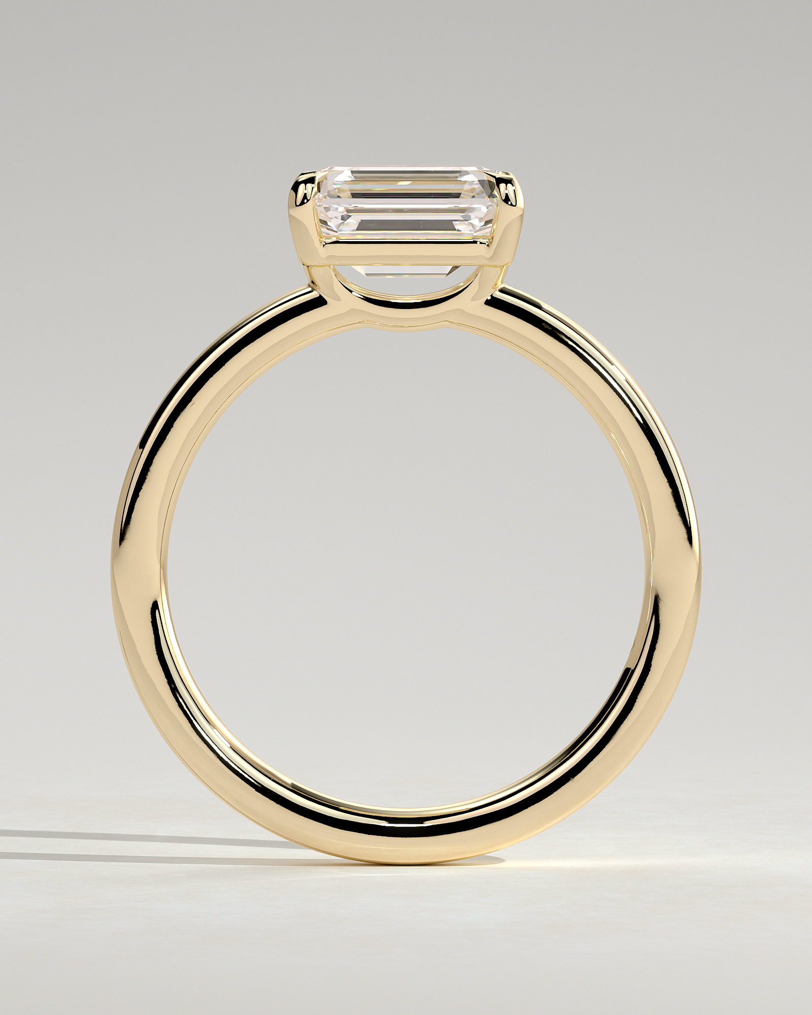 Evelyn  East West Emerald Solitaire - 18k Yellow Gold