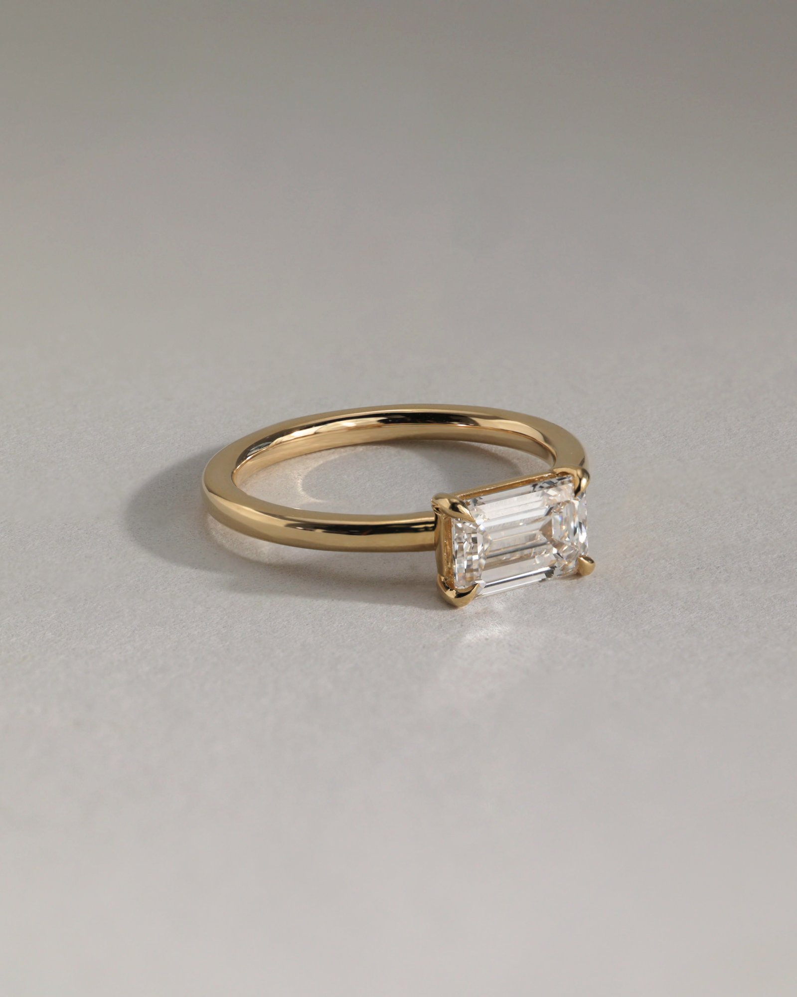 Evelyn  East West Emerald Solitaire Lifestyle Image