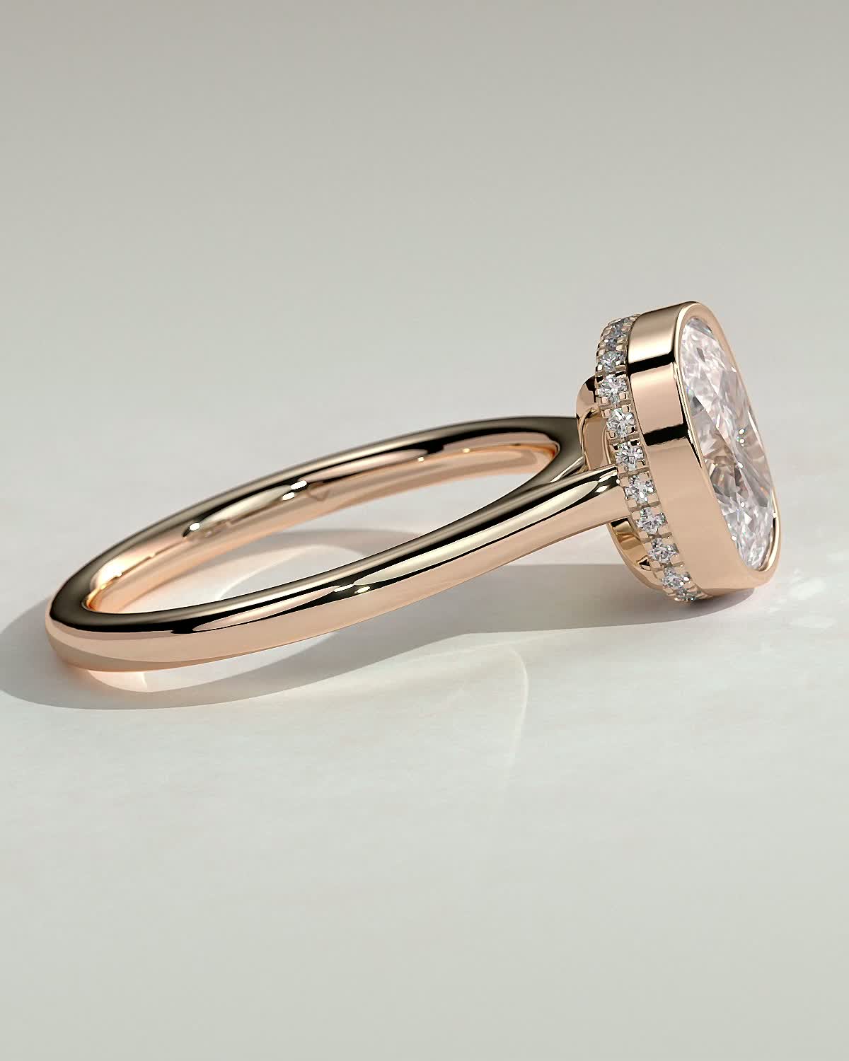 Elongated Cushion Bezel Solitaire with Hidden Halo and Cathedral Setting Engagement Ring - 18k Rose Gold