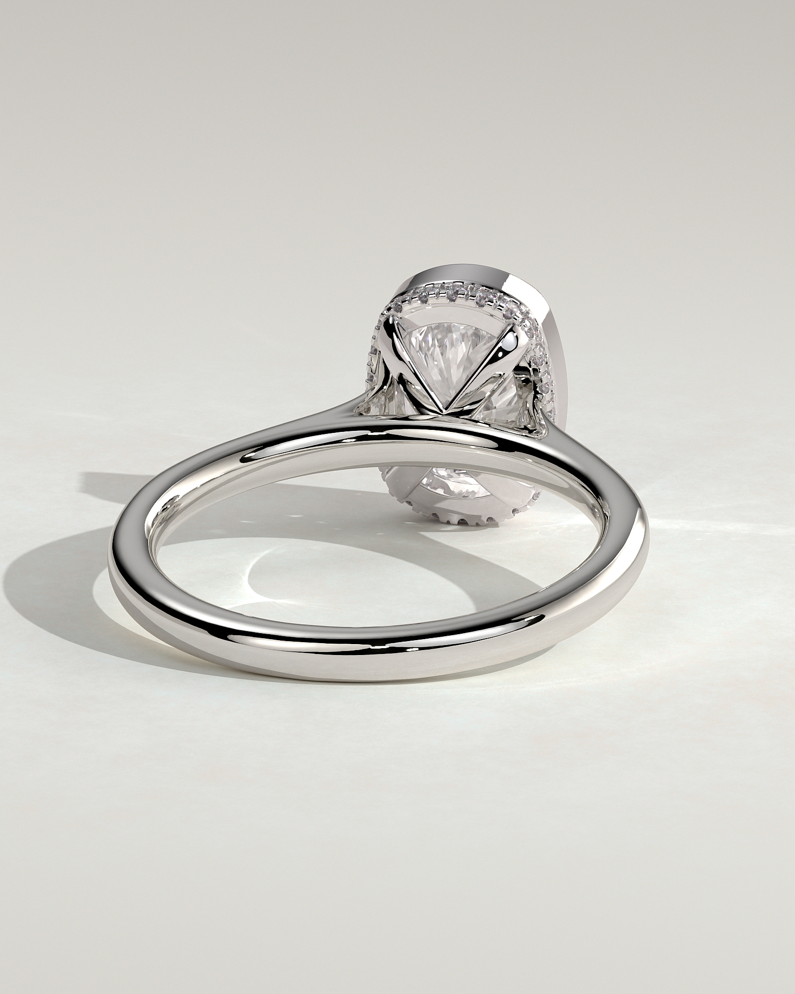 Elongated Cushion Bezel Solitaire with Hidden Halo and Cathedral Setting Engagement Ring - 18k White Gold