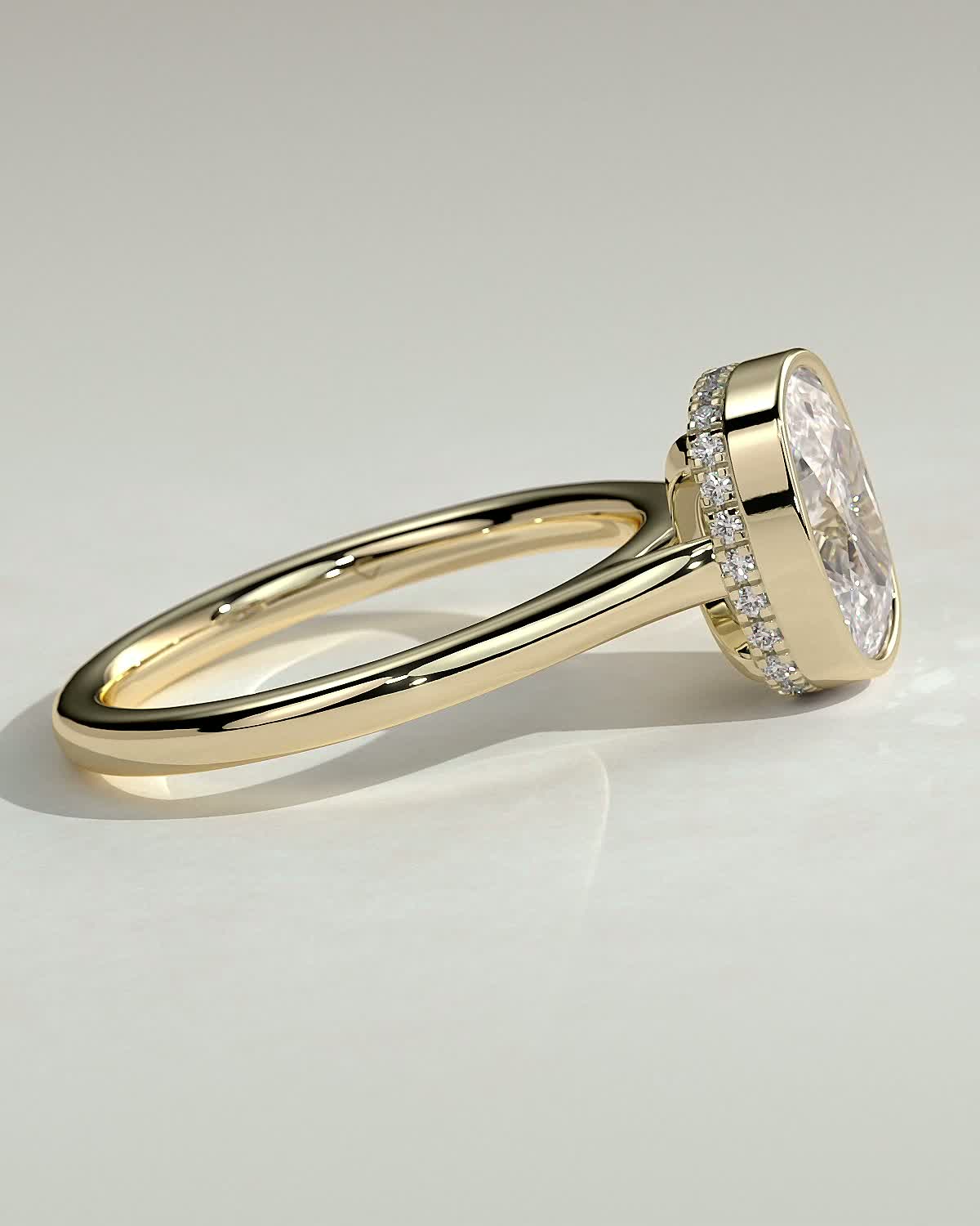 Elongated Cushion Bezel Solitaire with Hidden Halo and Cathedral Setting Engagement Ring - 18k Yellow Gold