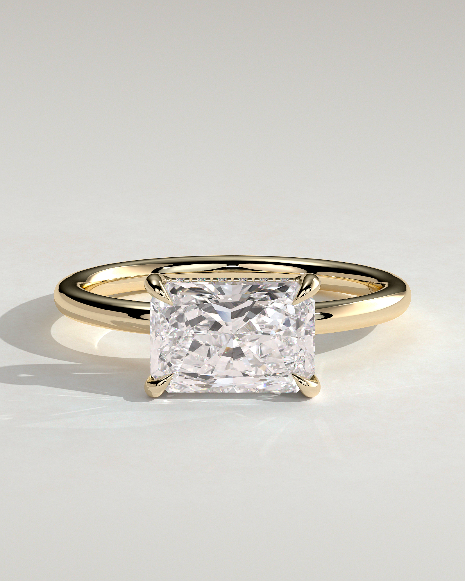 Francene - East West Radiant Solitaire with Hidden Halo - 18k Yellow Gold