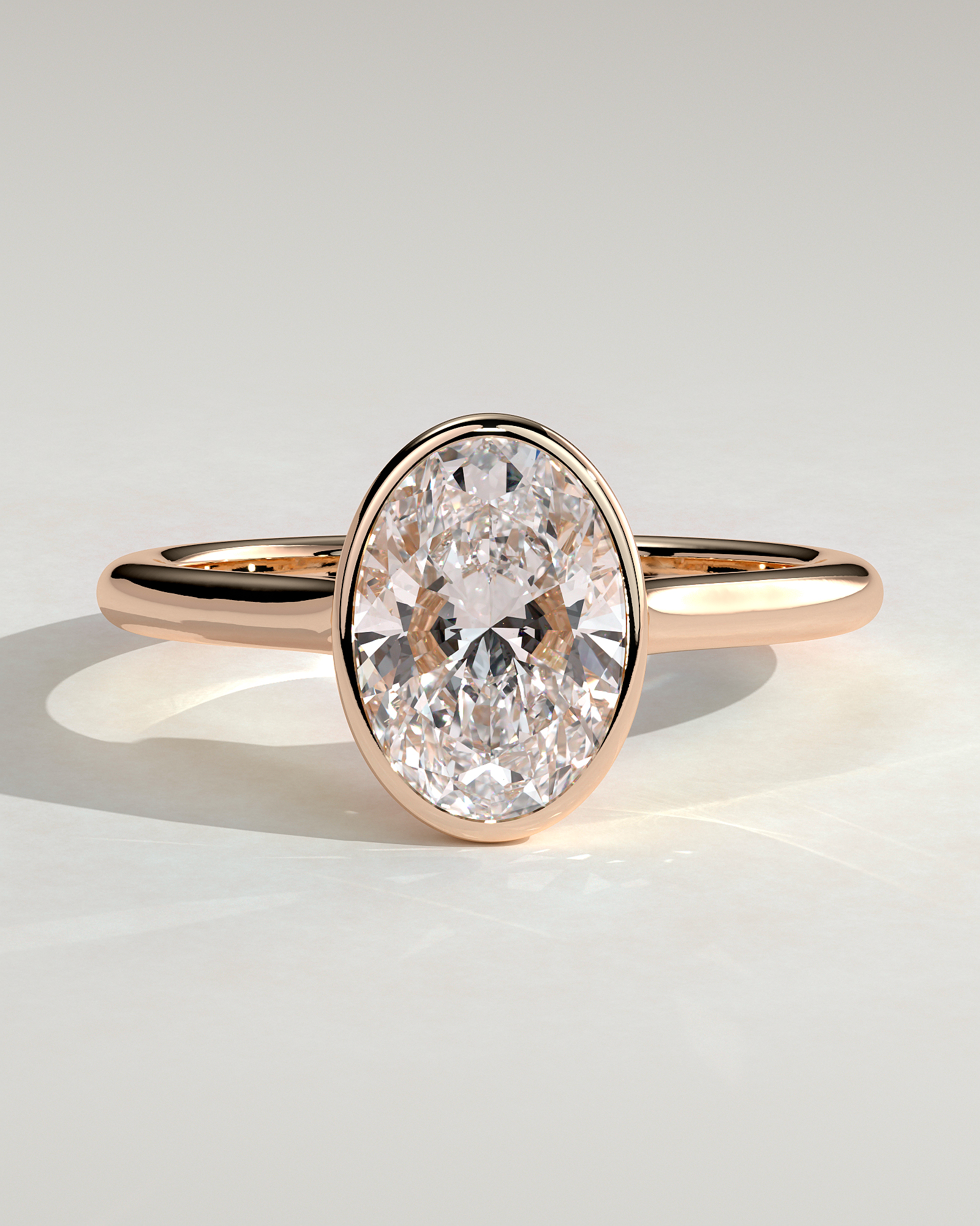 Gemma  Bezel Set Oval Solitaire - 18k Rose Gold
