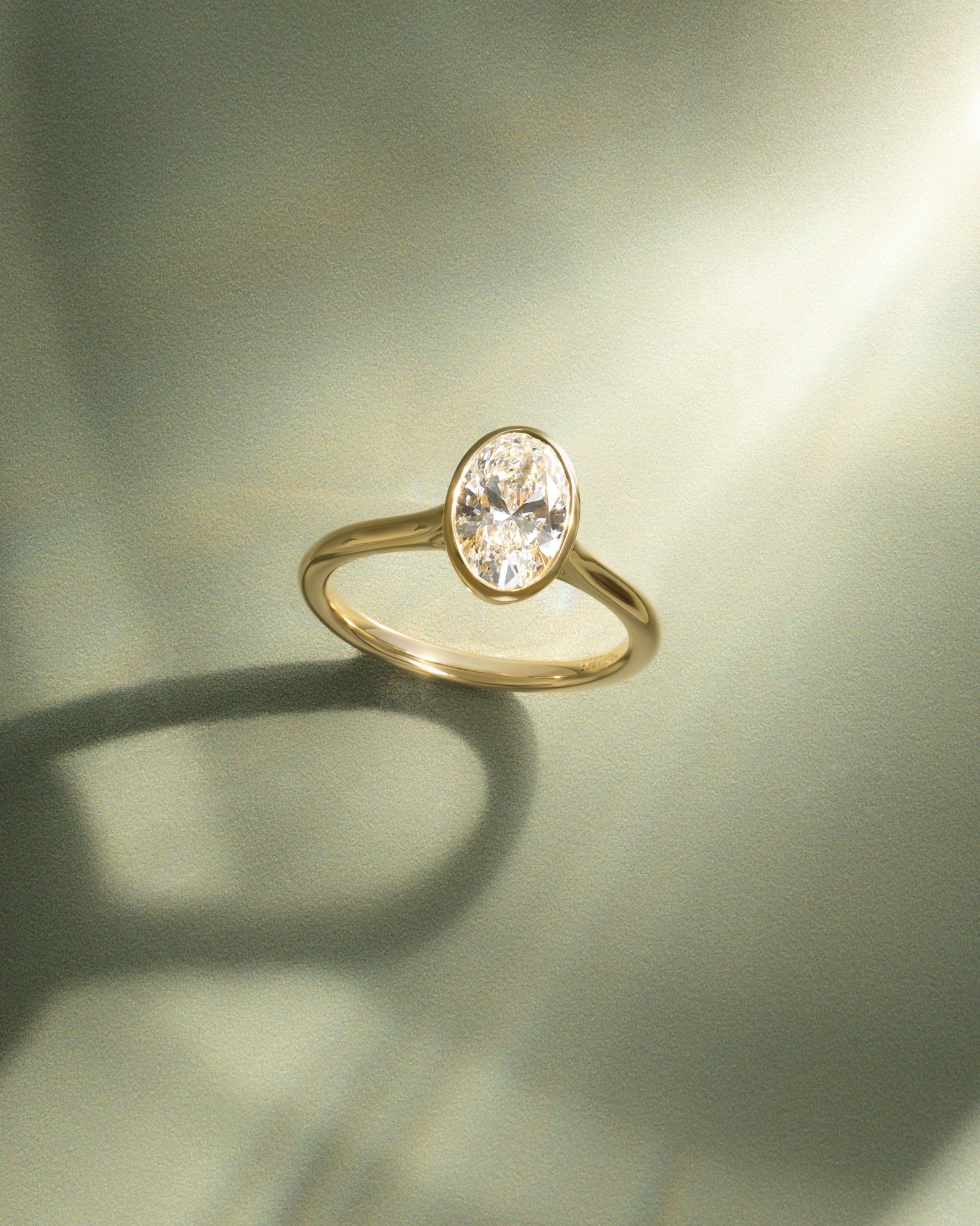 Gemma  Bezel Set Oval Solitaire Lifestyle Image