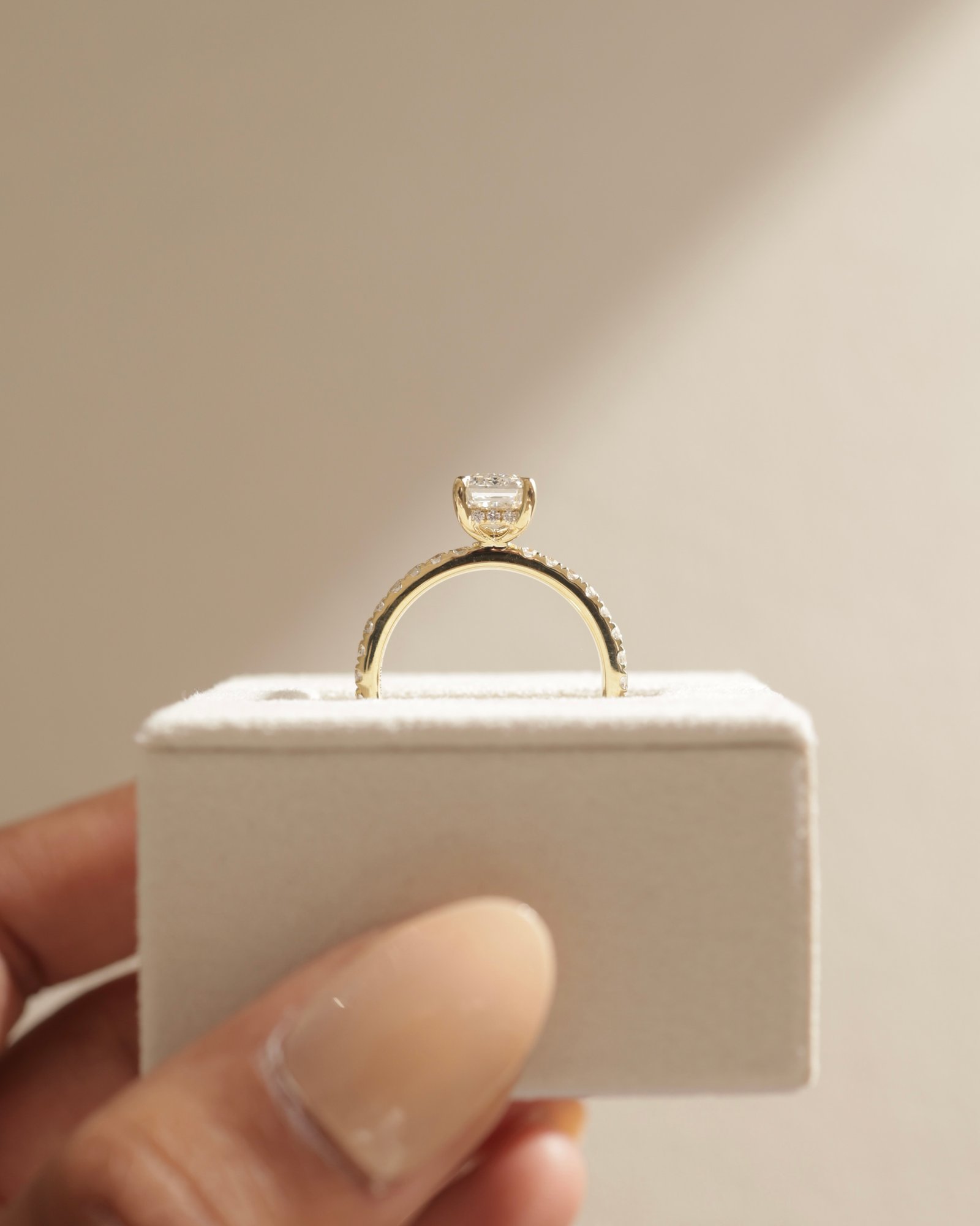 Gwyneth - Emerald Solitaire with Hidden Halo Lifestyle Image