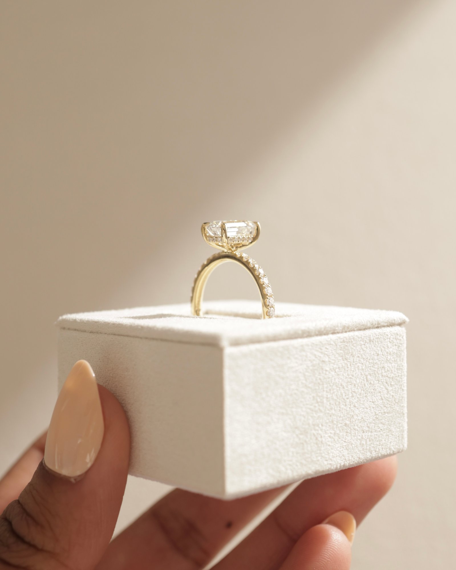 Gwyneth - Emerald Solitaire with Hidden Halo Lifestyle Image