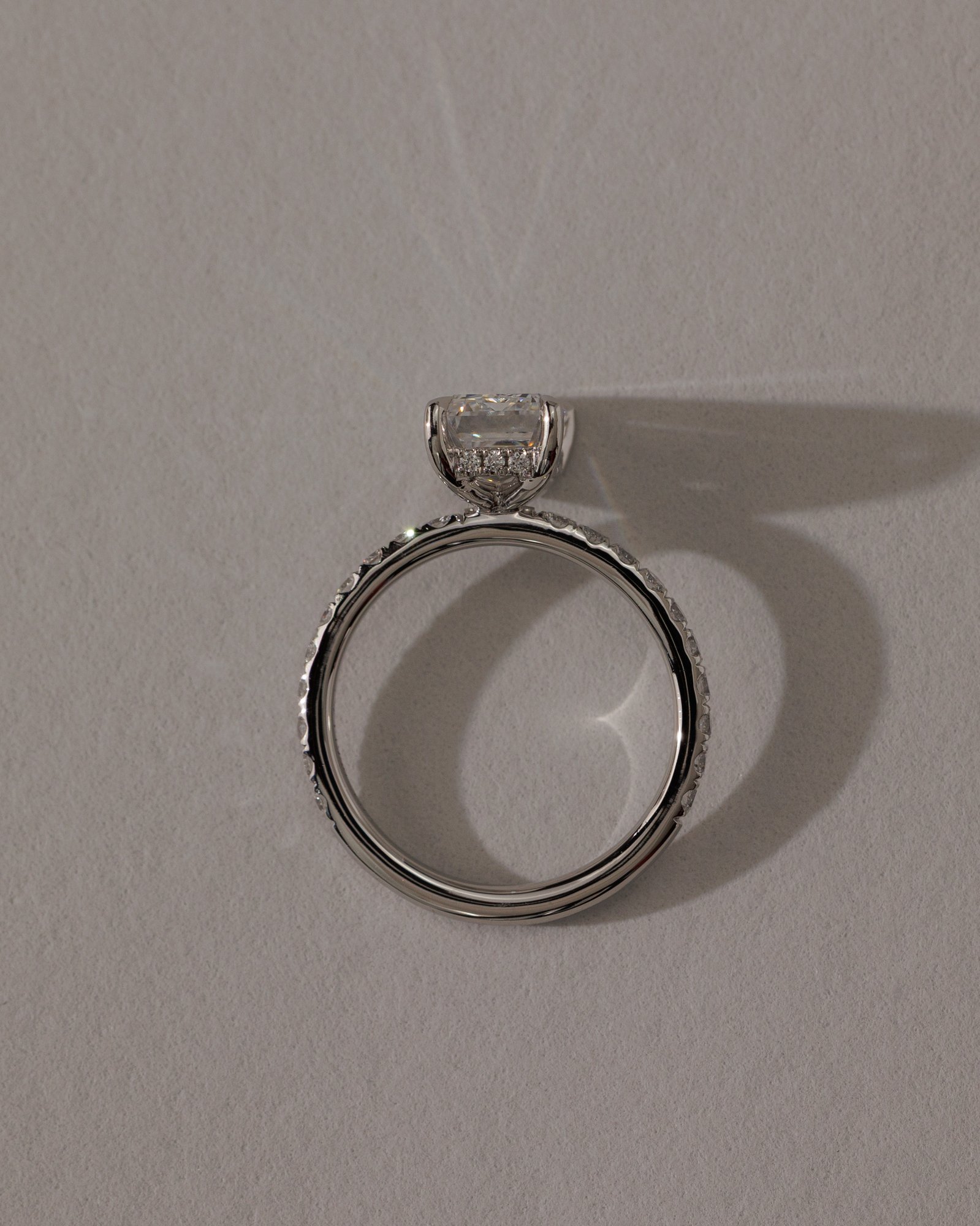 Gwyneth - Emerald Solitaire with Hidden Halo Lifestyle Image