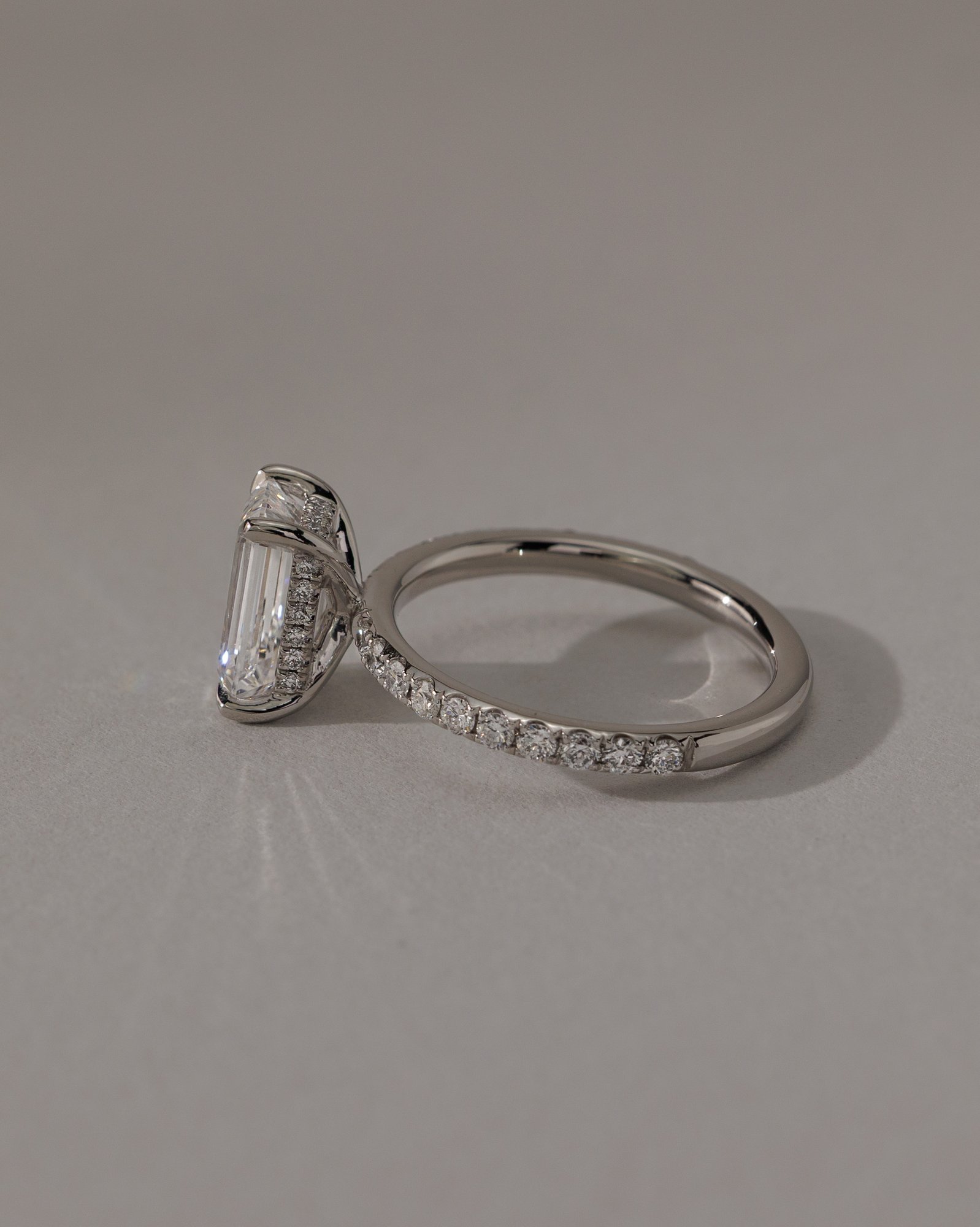 Gwyneth - Emerald Solitaire with Hidden Halo Lifestyle Image