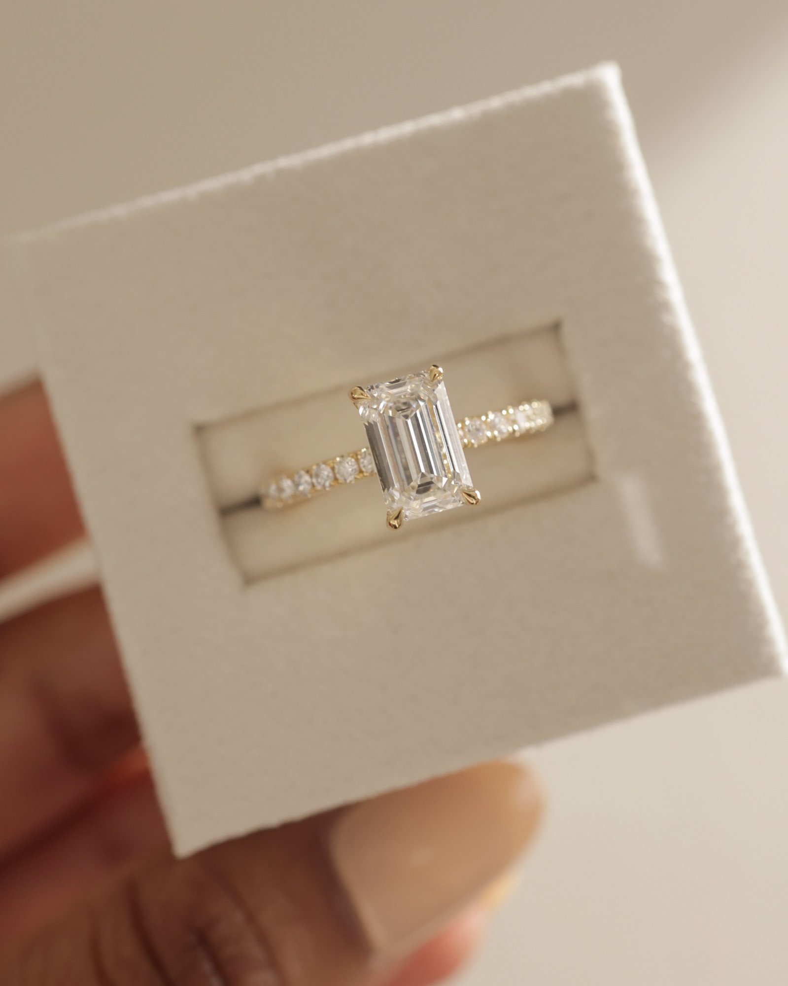 Gwyneth - Emerald Solitaire with Hidden Halo Lifestyle Image