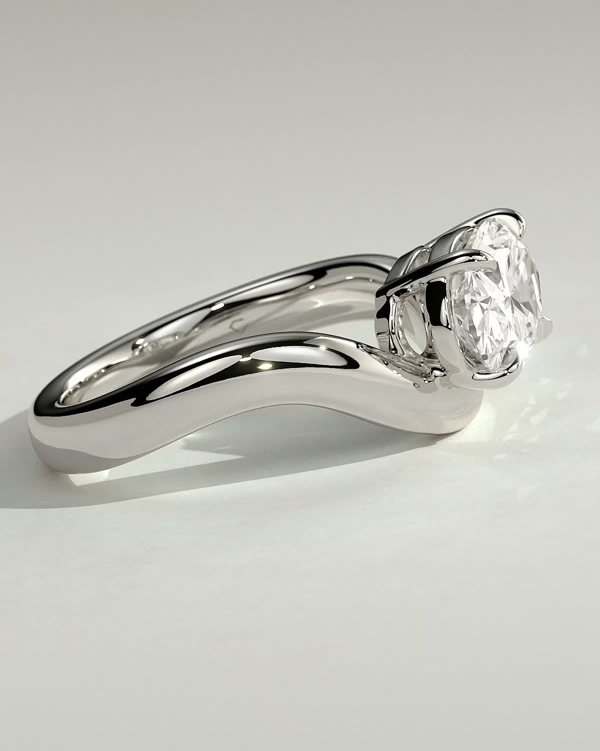 Hayley - Oval Solitaire with Twist Band - 18k White Gold