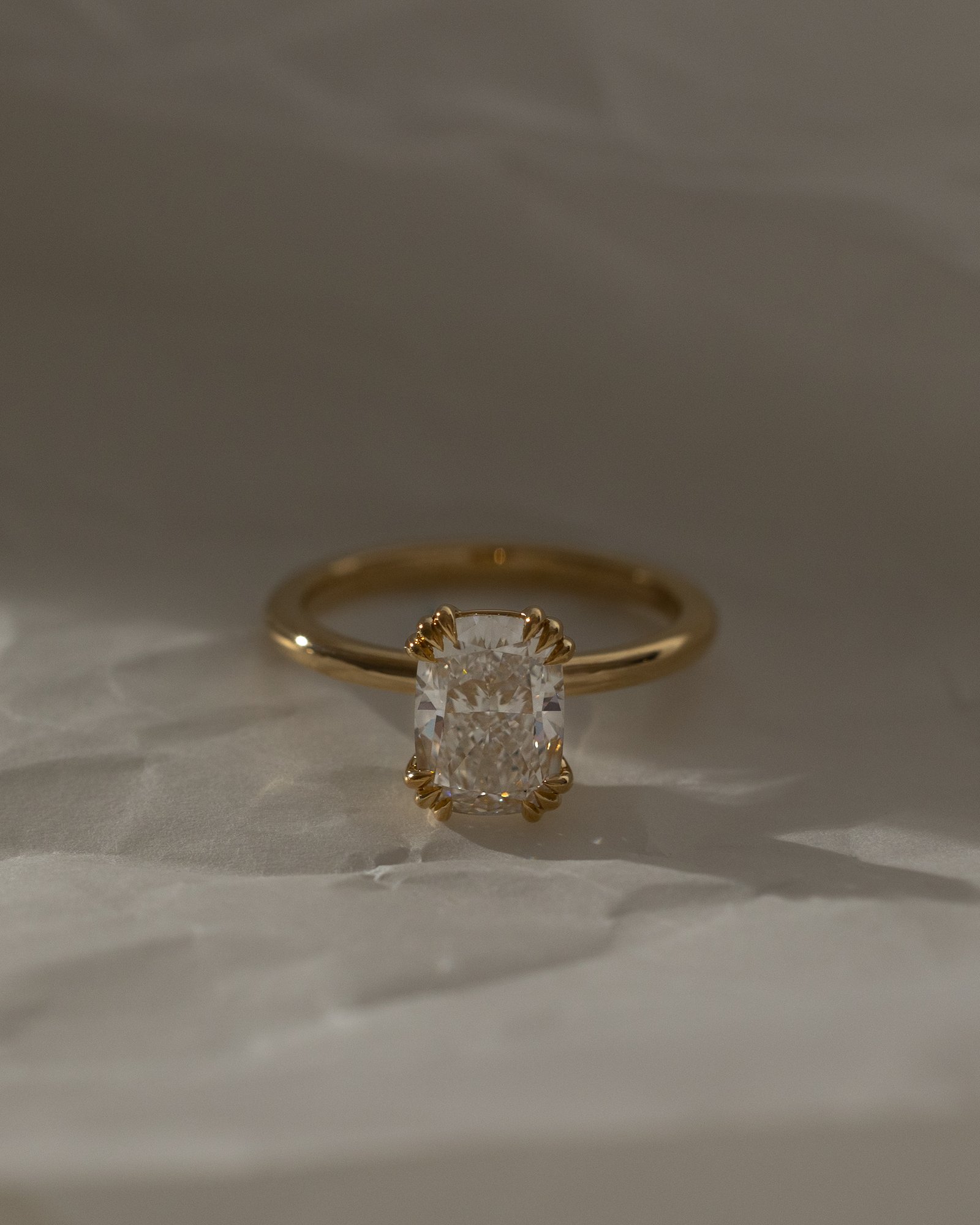 Helena  Elongated Cushion Solitaire with Triple-Split Claws Lifestyle Image