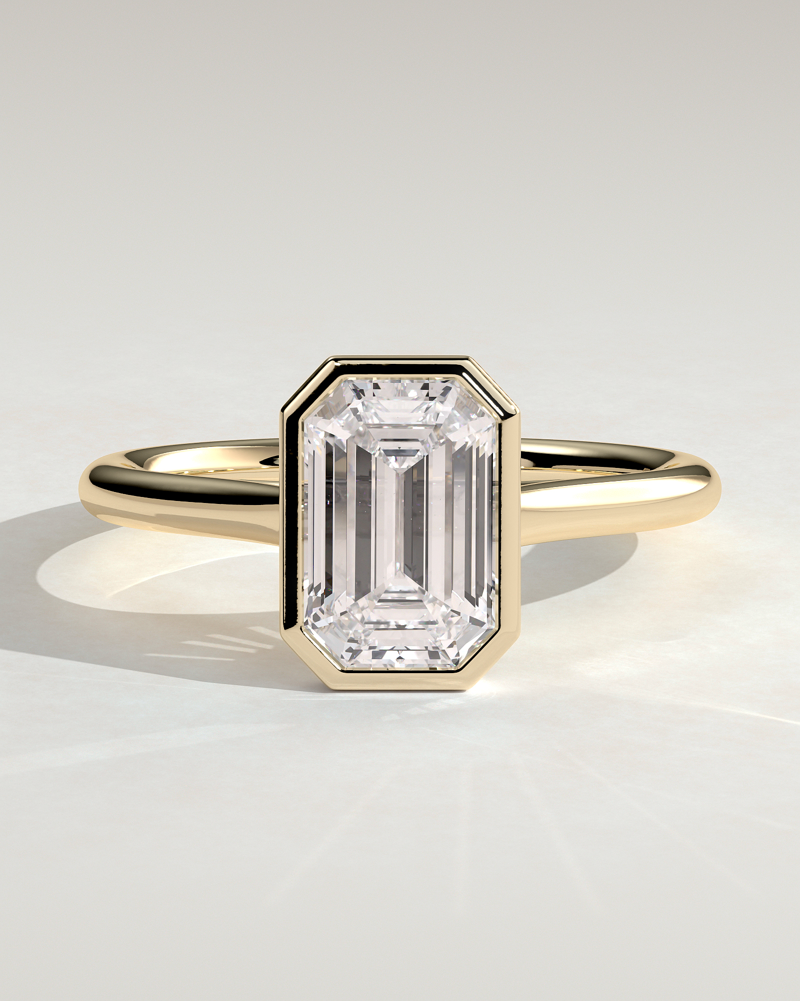 Imani - Bezel Set Emerald Solitaire - 18k Yellow Gold