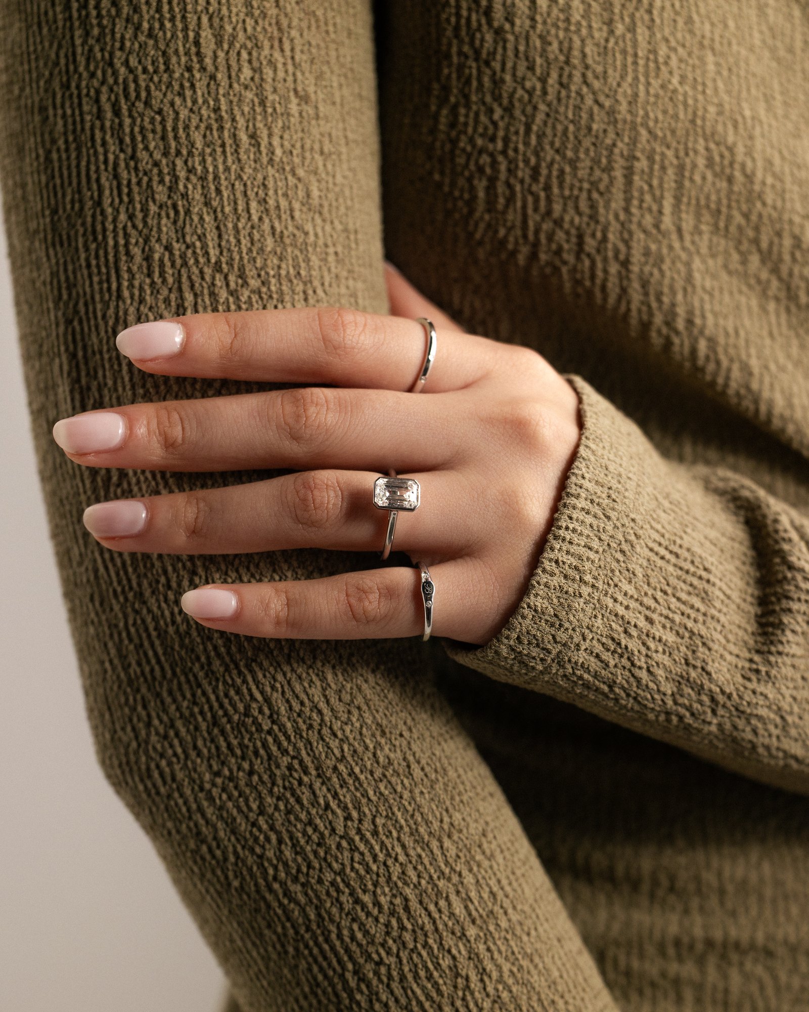 Imani - Bezel Set Emerald Solitaire Lifestyle Image