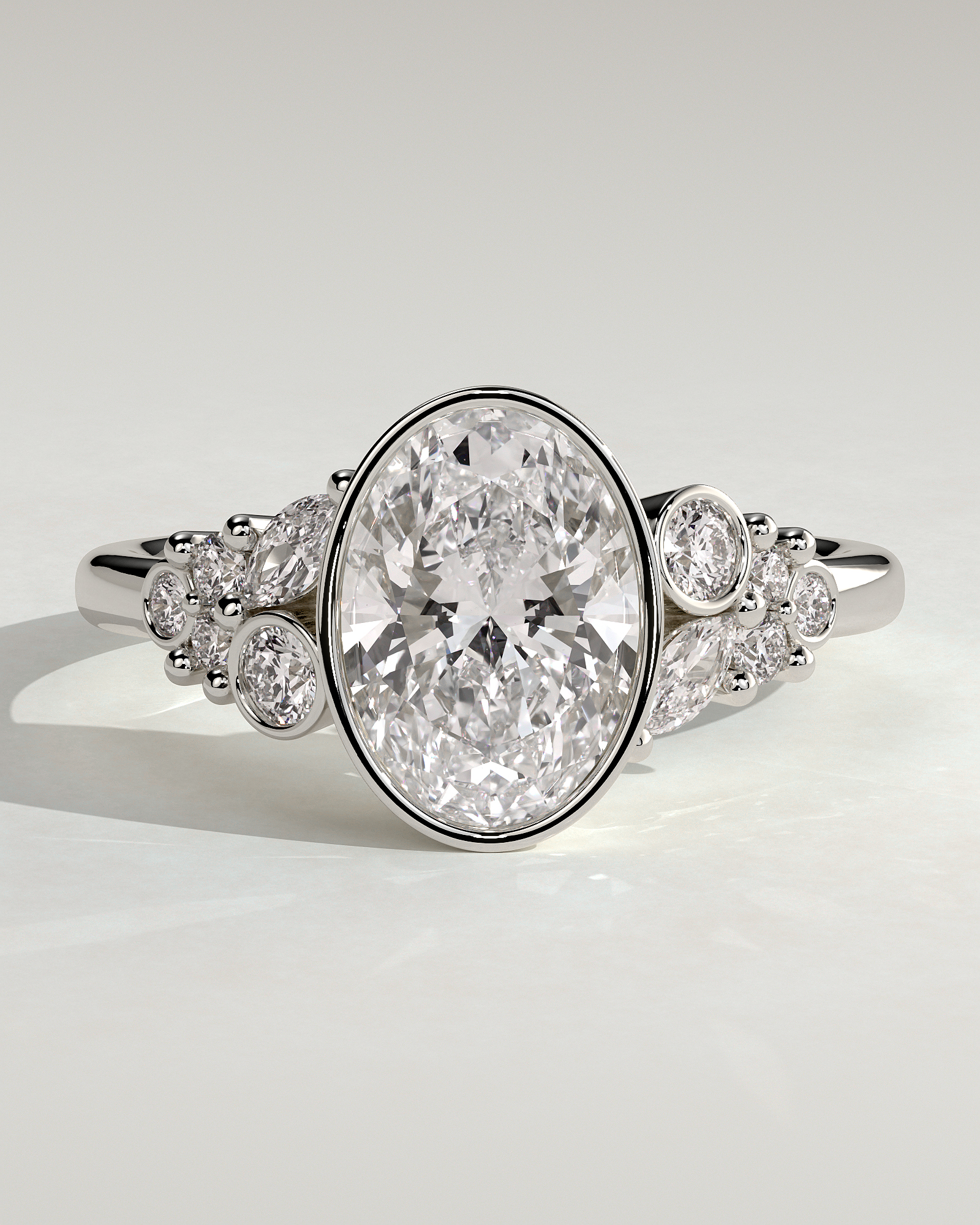 Oval Bezel Solitaire with Clustered Round-Marquise Mixed Set Shoulder Stones Engagement Ring - 18k White Gold