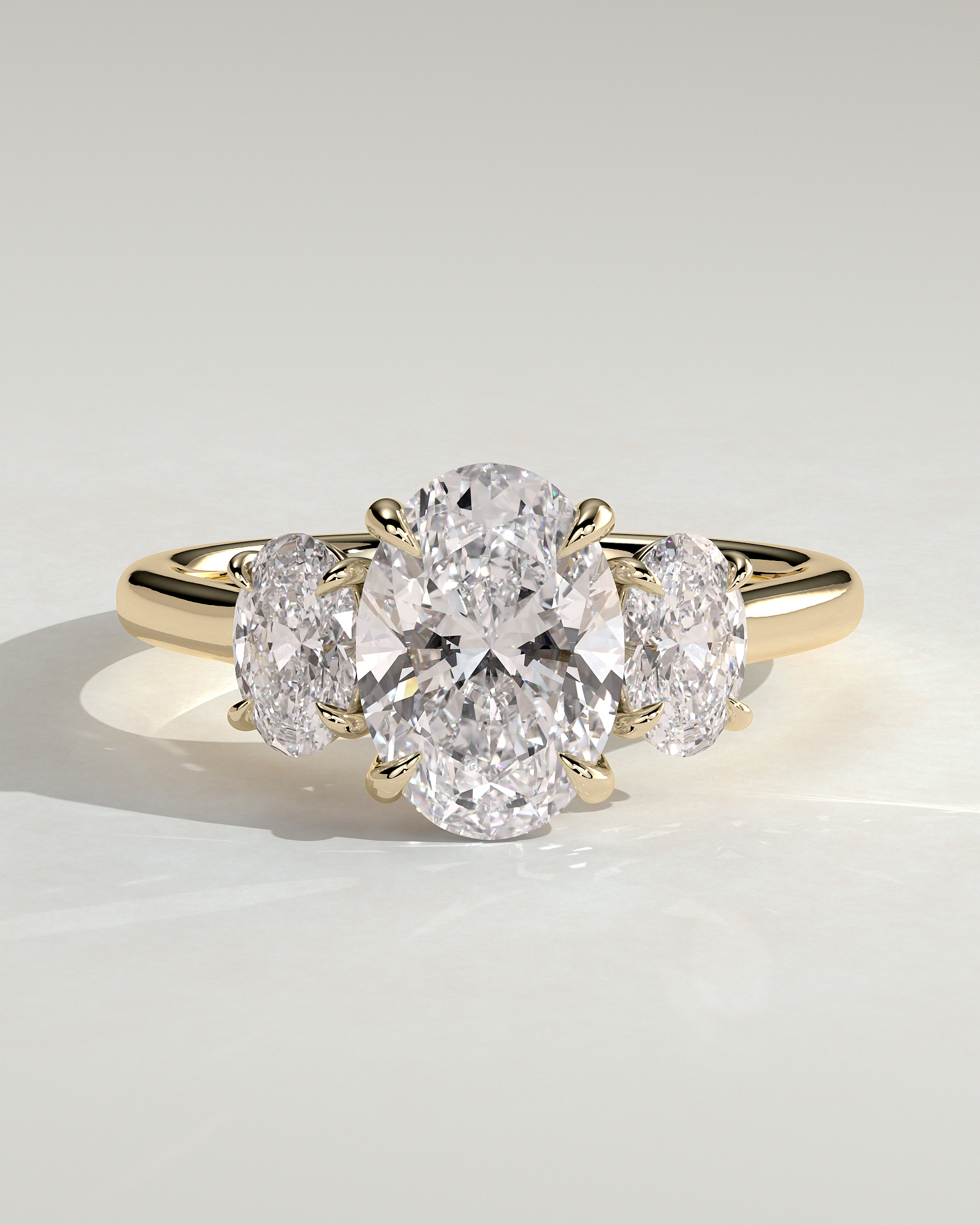 Oval 4 Claw Trilogy Engagement Ring - 18k Yellow Gold