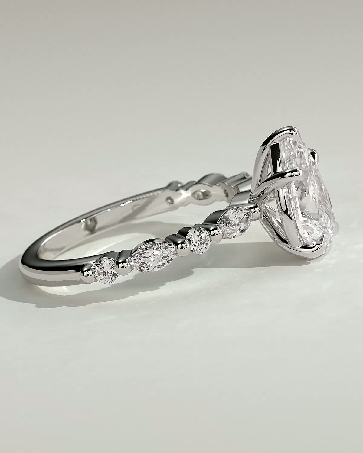Jacinta - Pear Solitaire with Accent Band - 18k White Gold