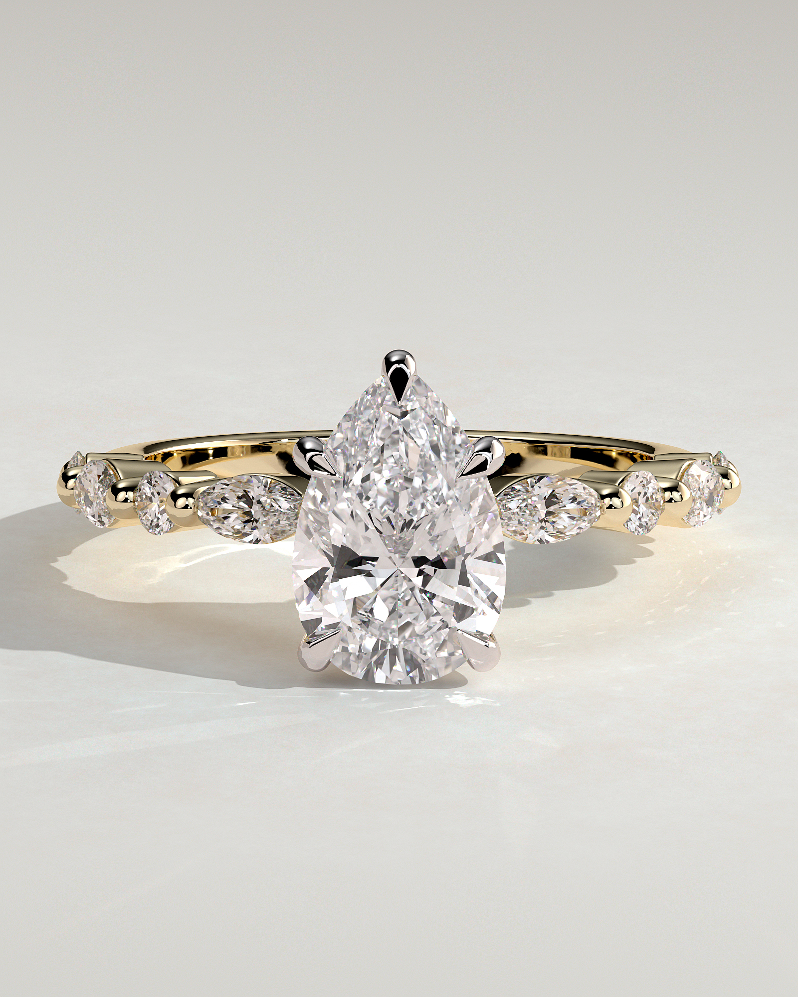 Jacinta - Pear Solitaire with Accent Band - 18k Yellow Gold / 18k White Gold