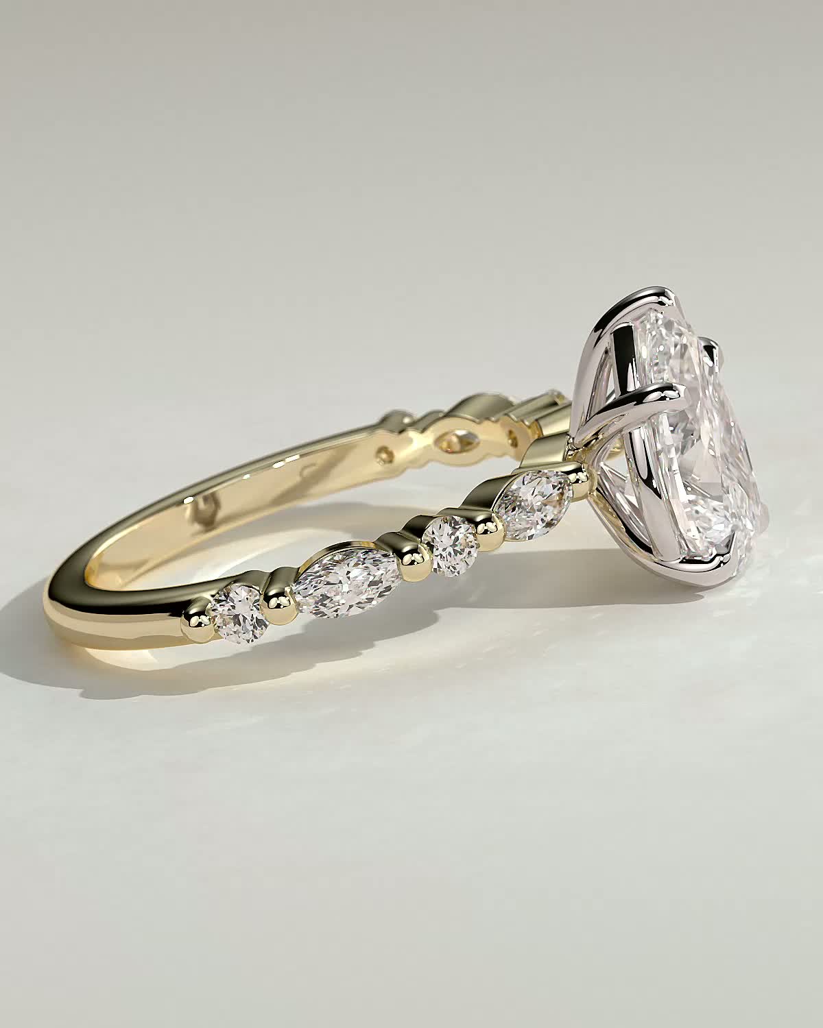 Jacinta - Pear Solitaire with Accent Band - 18k Yellow Gold / 18k White Gold