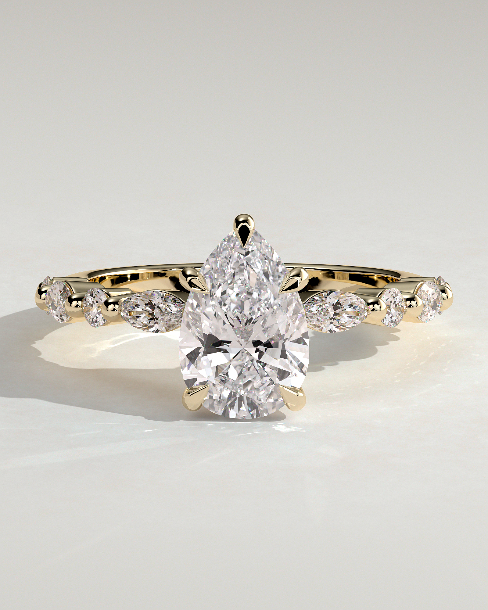 Jacinta - Pear Solitaire with Accent Band - 18k Yellow Gold