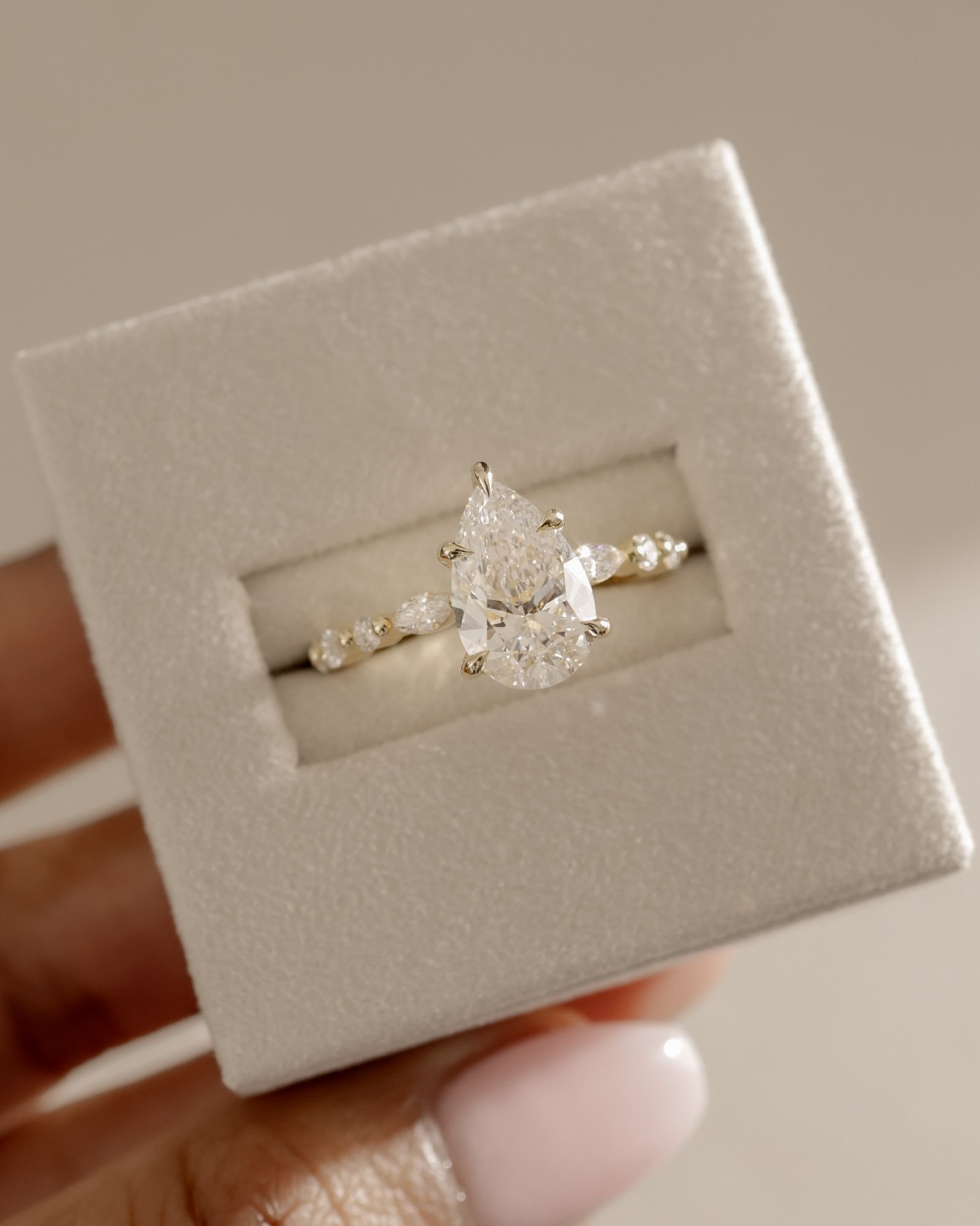 Jacinta - Pear Solitaire with Accent Band Lifestyle Image