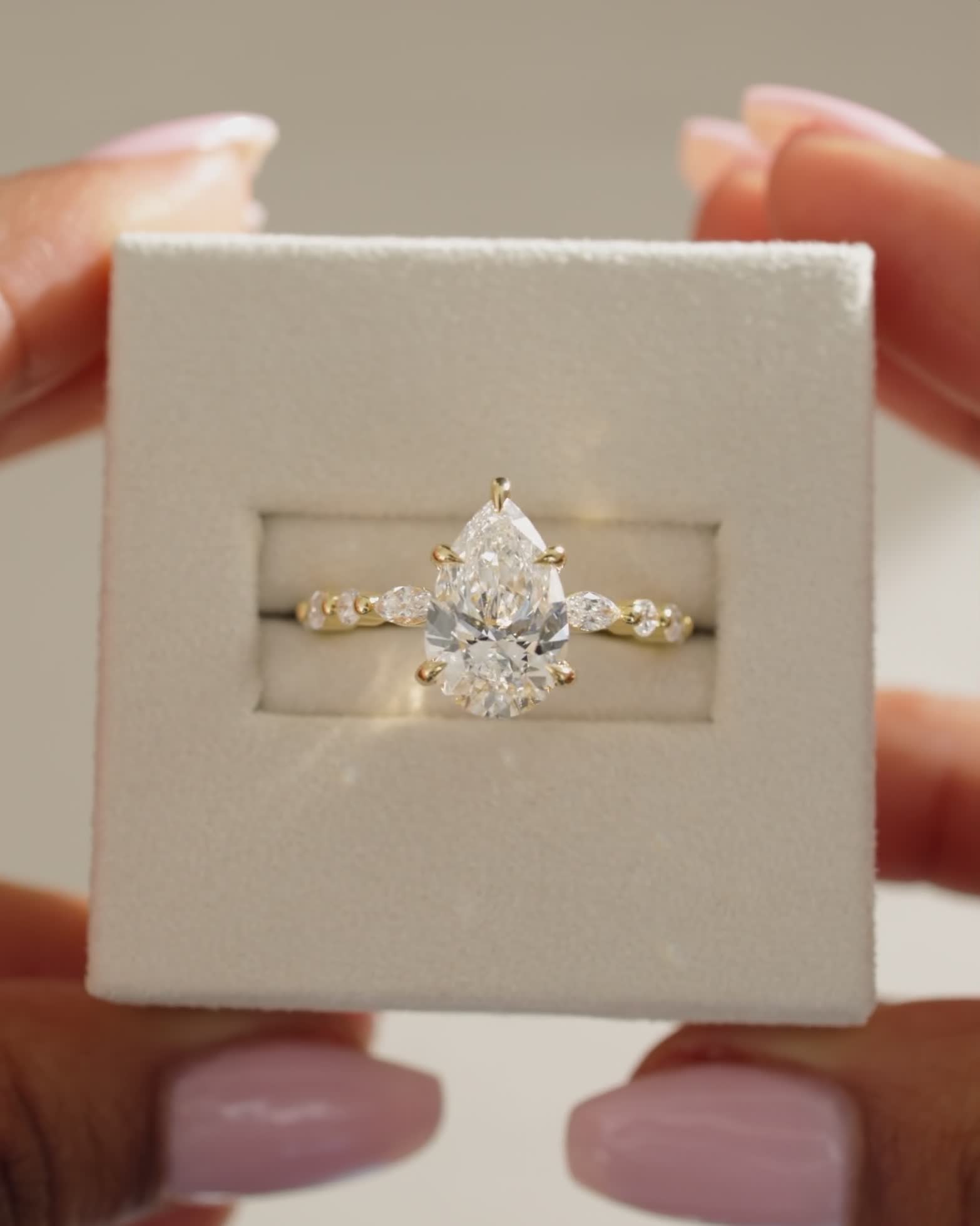 Jacinta - Pear Solitaire with Accent Band Lifestyle Image