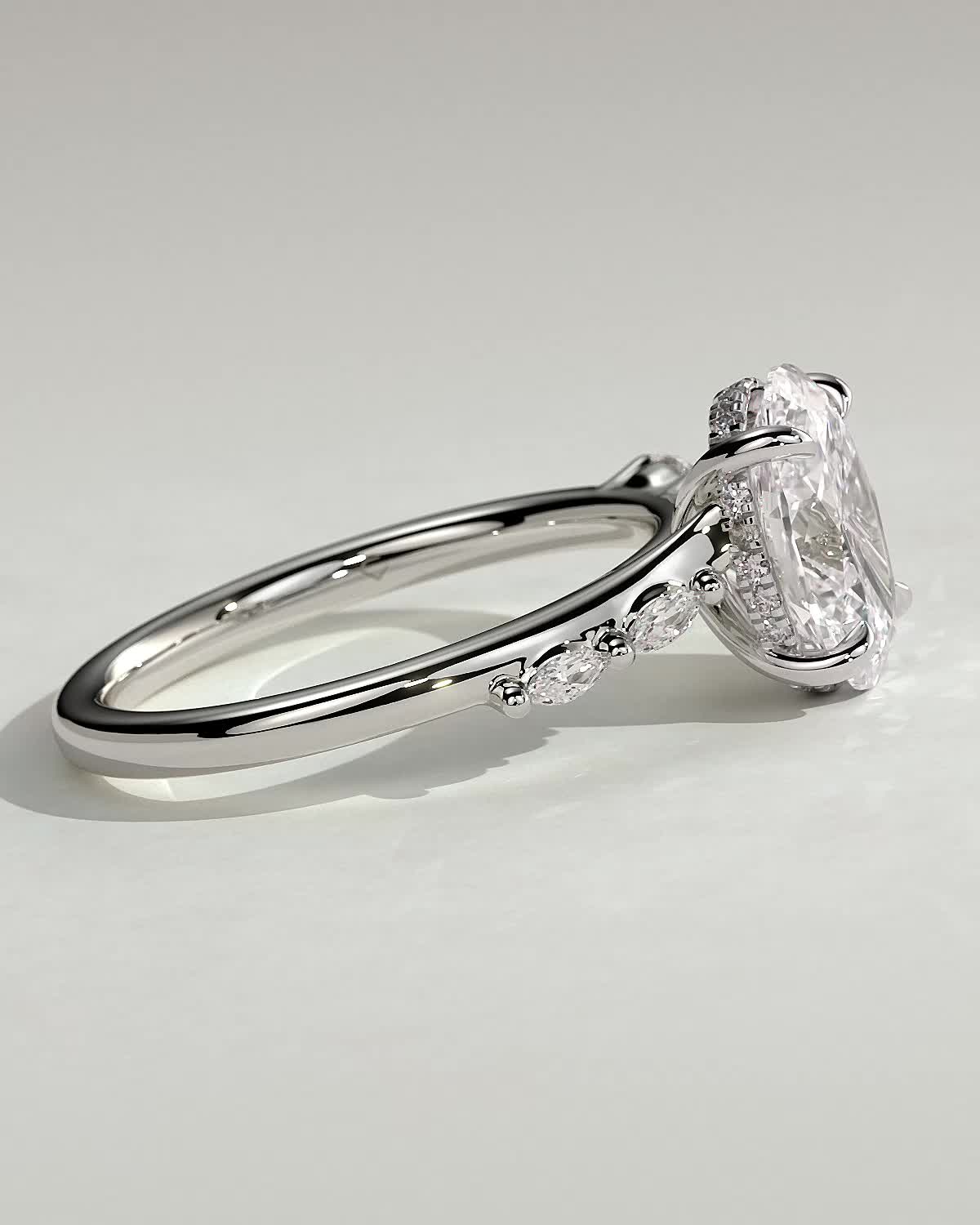 Jamie - Oval Solitaire with Opposing Marquise Accents - 18k White Gold