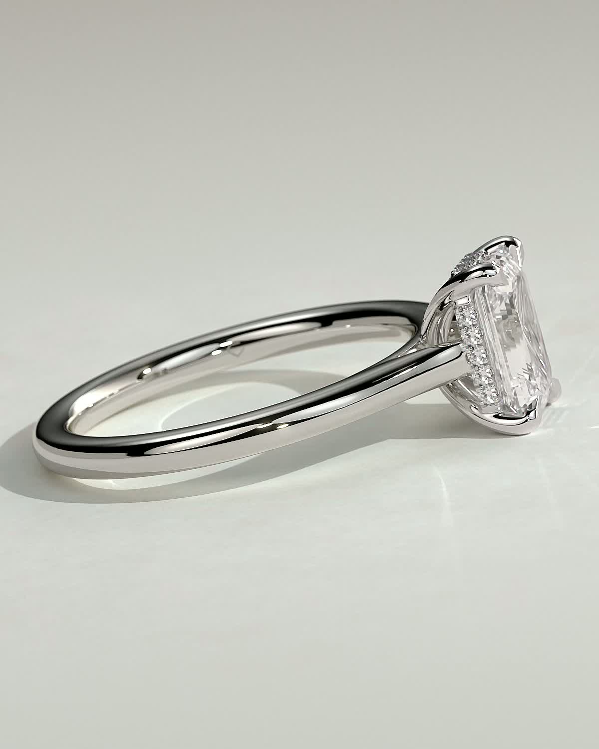 Jane - Emerald Solitaire with Hidden Halo and Cathedral Setting - 18k White Gold