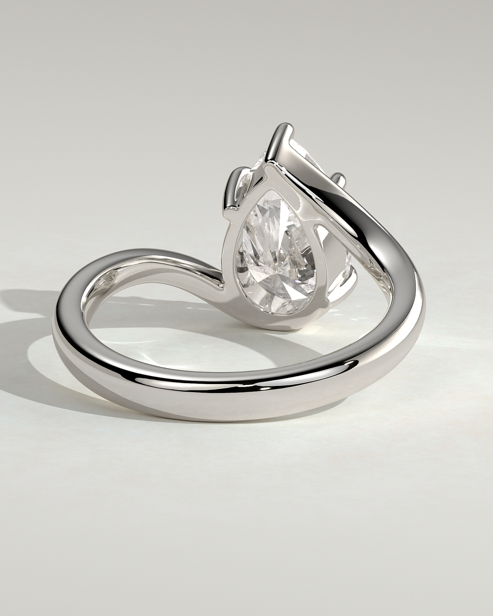 Pear 5 Claw Solitaire with Bypass Band Engagement Ring - 18k White Gold