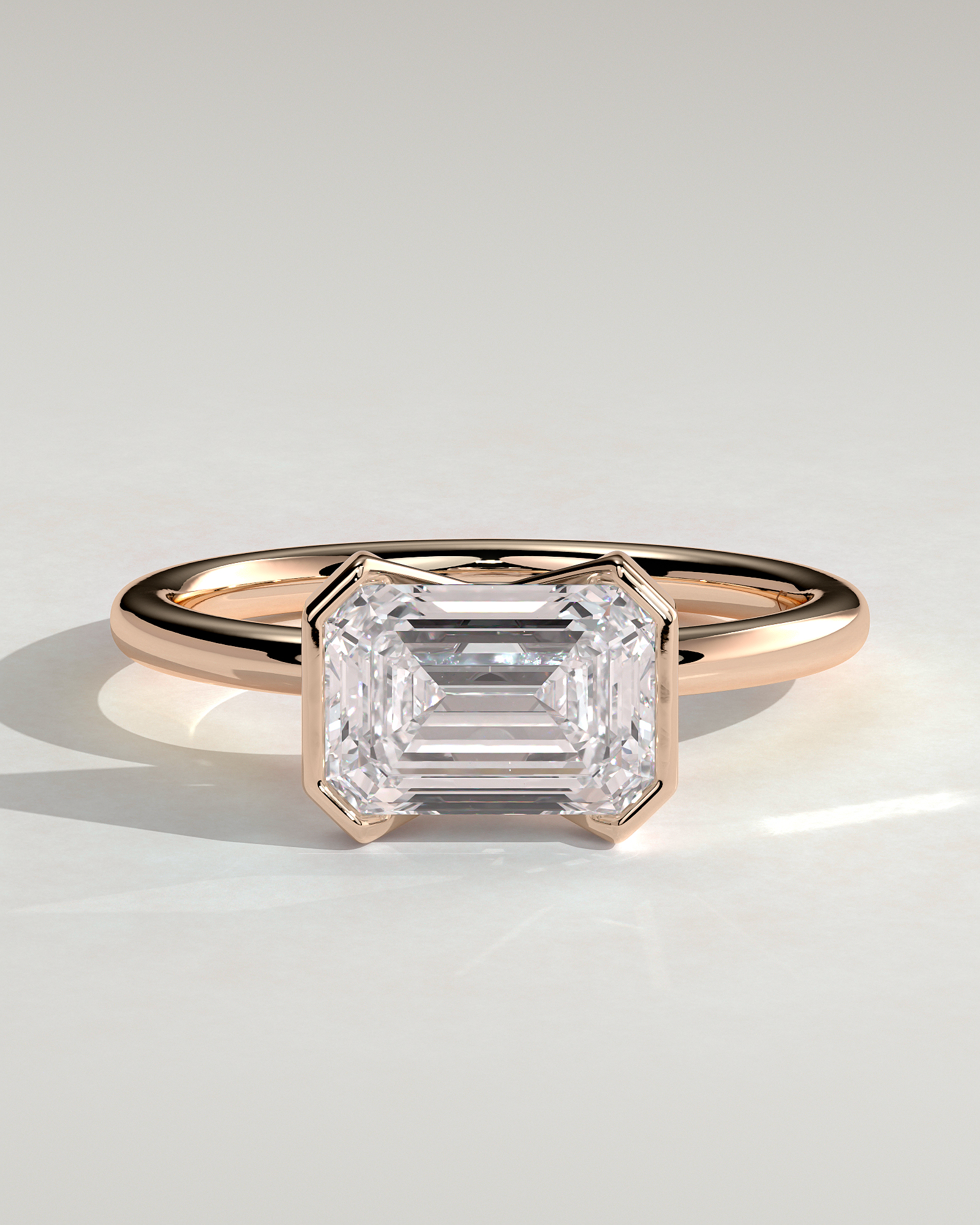 Jodie - Emerald Half Bezel Solitaire - 18k Rose Gold