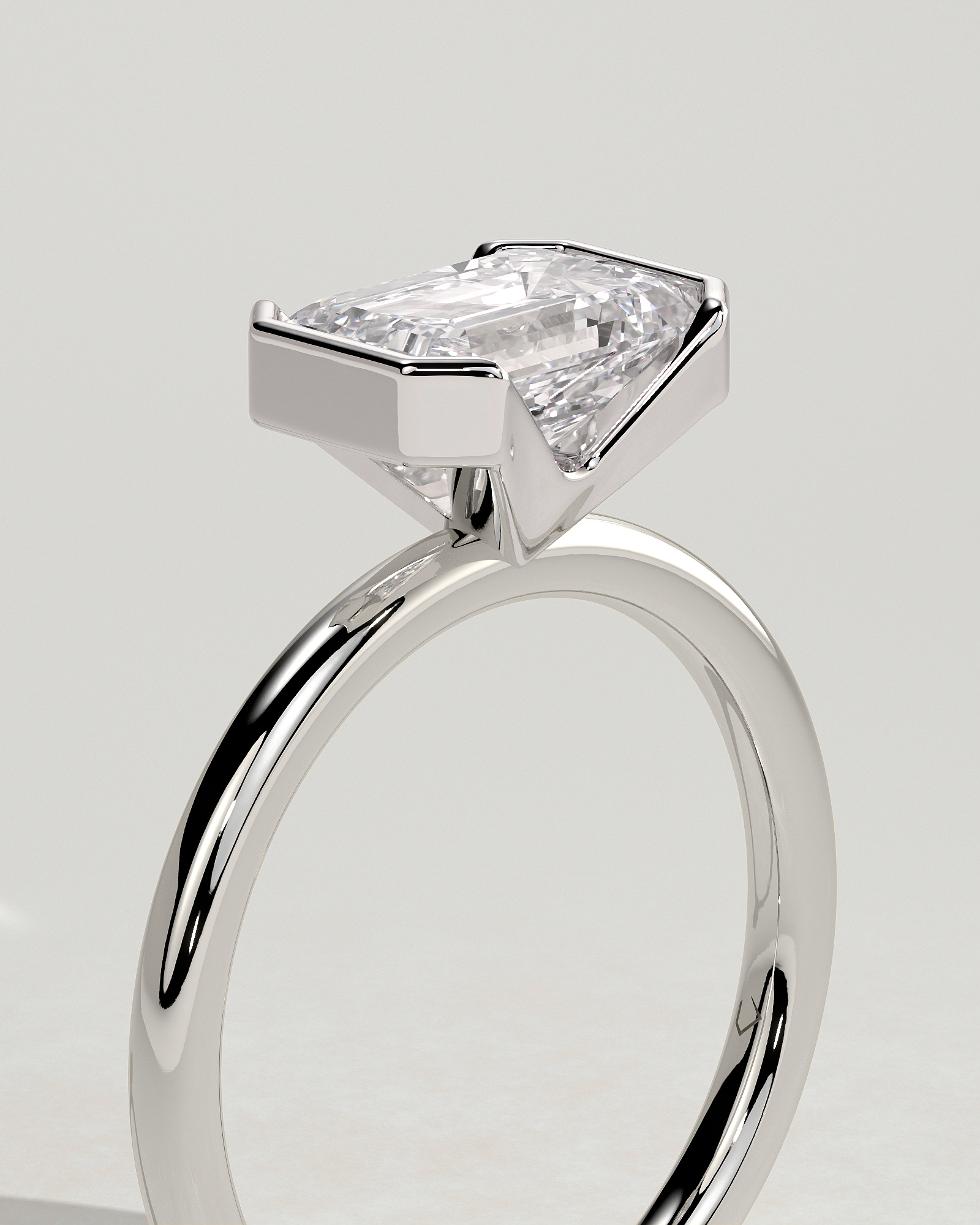 Jodie - Emerald Half Bezel Solitaire - 18k White Gold