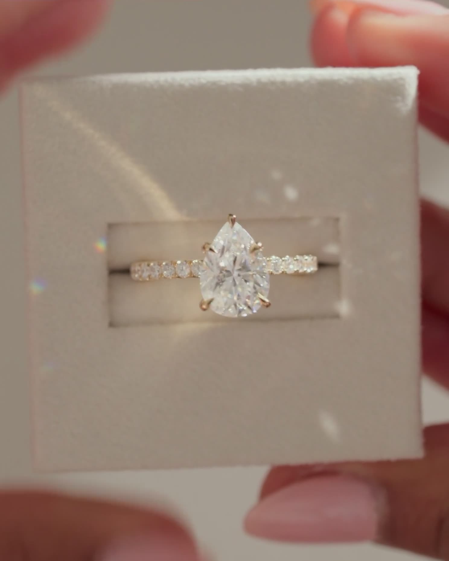 Jordanna  5 Claw Pear Pav Solitaire with Hidden Halo Lifestyle Image