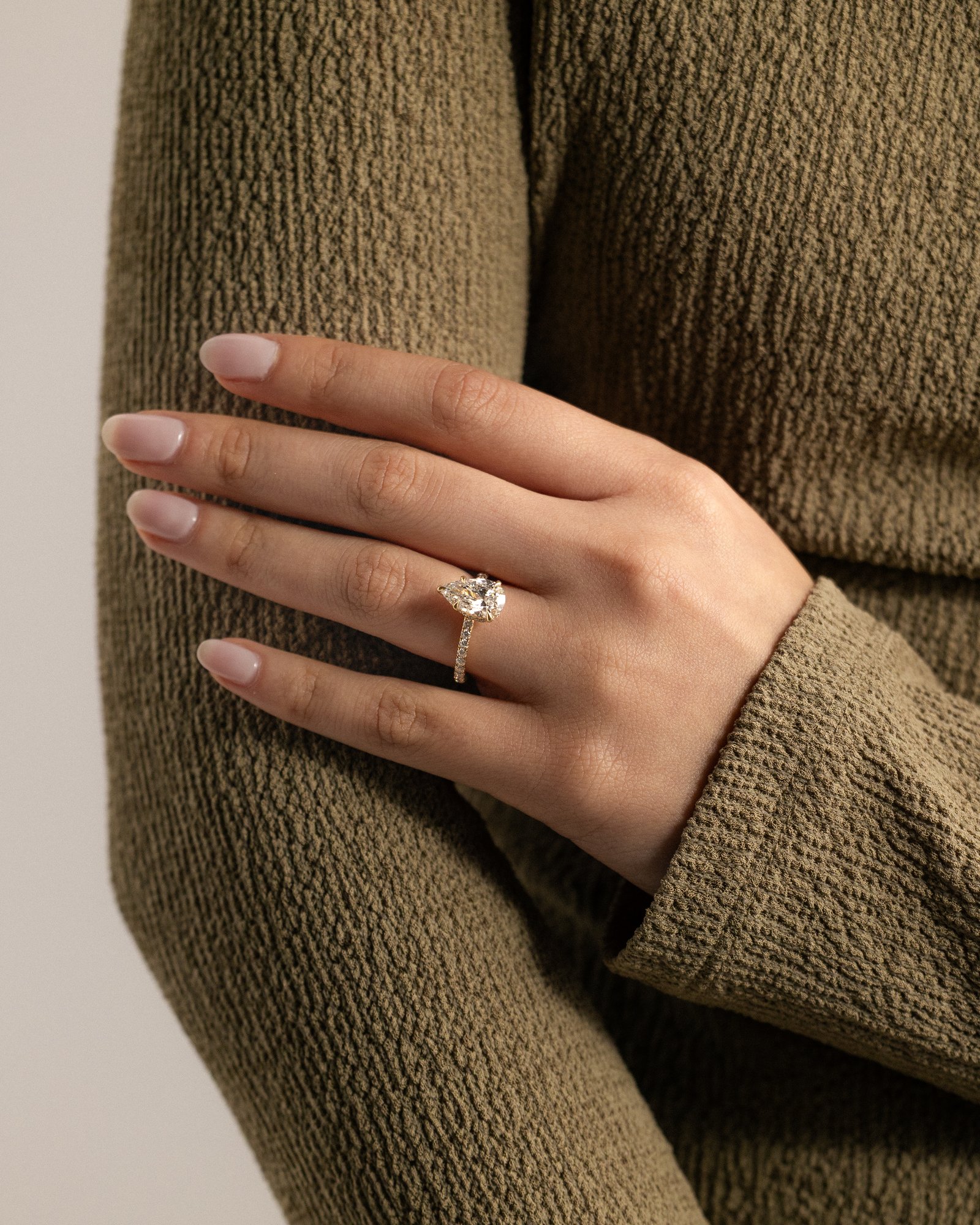 Jordanna  5 Claw Pear Pav Solitaire with Hidden Halo Lifestyle Image