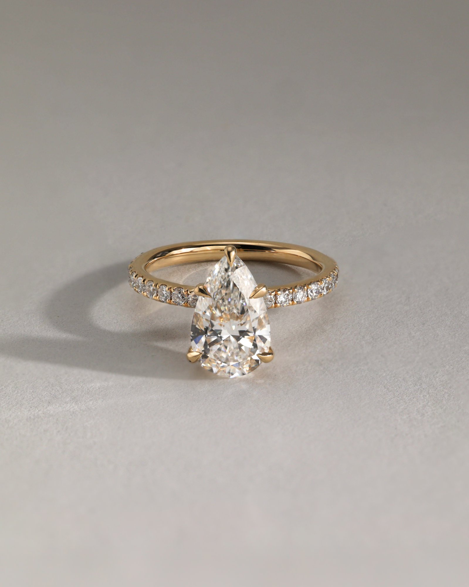 Jordanna  5 Claw Pear Pav Solitaire with Hidden Halo Lifestyle Image