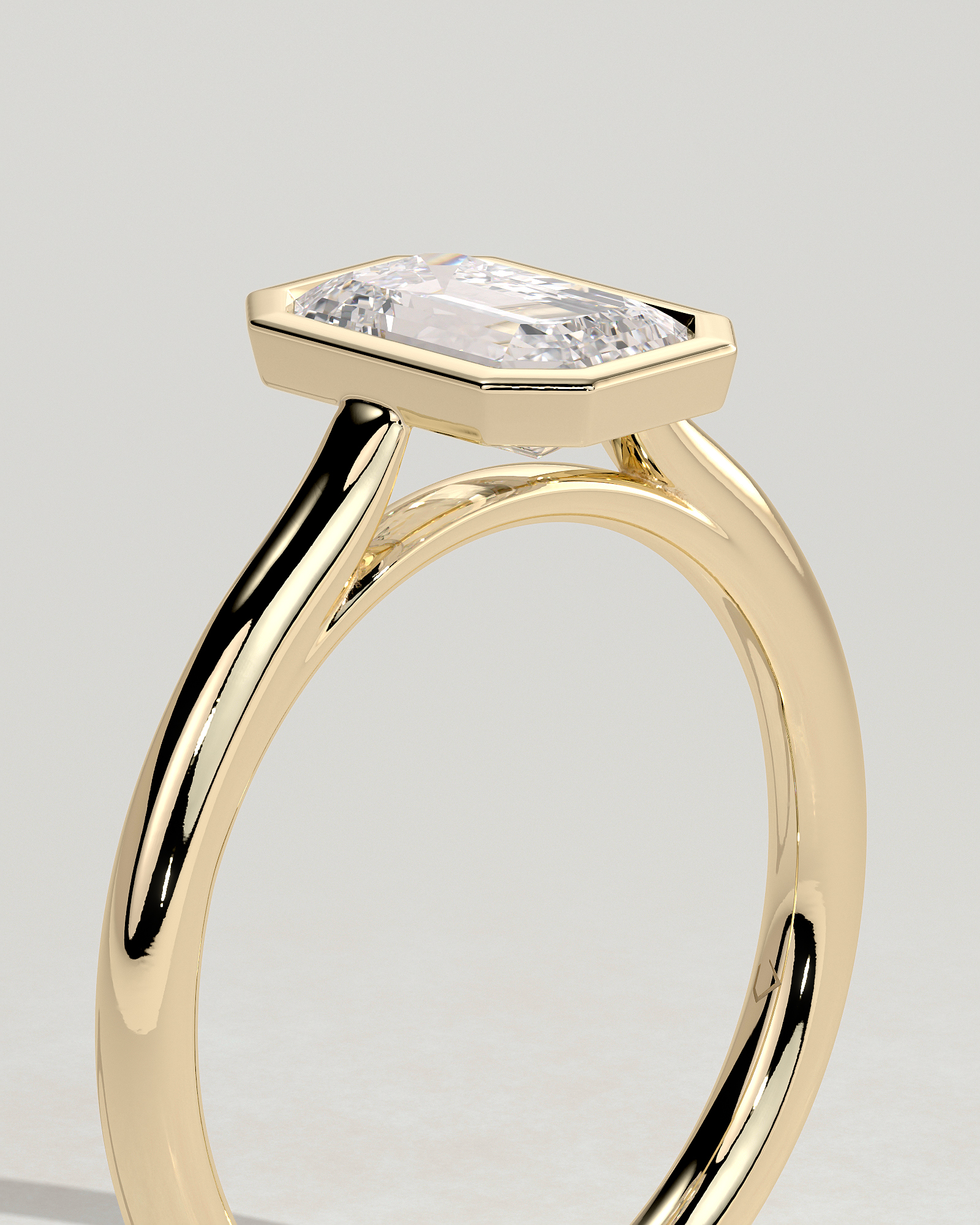 Journee - Bezel Set Emerald Solitaire - 18k Yellow Gold