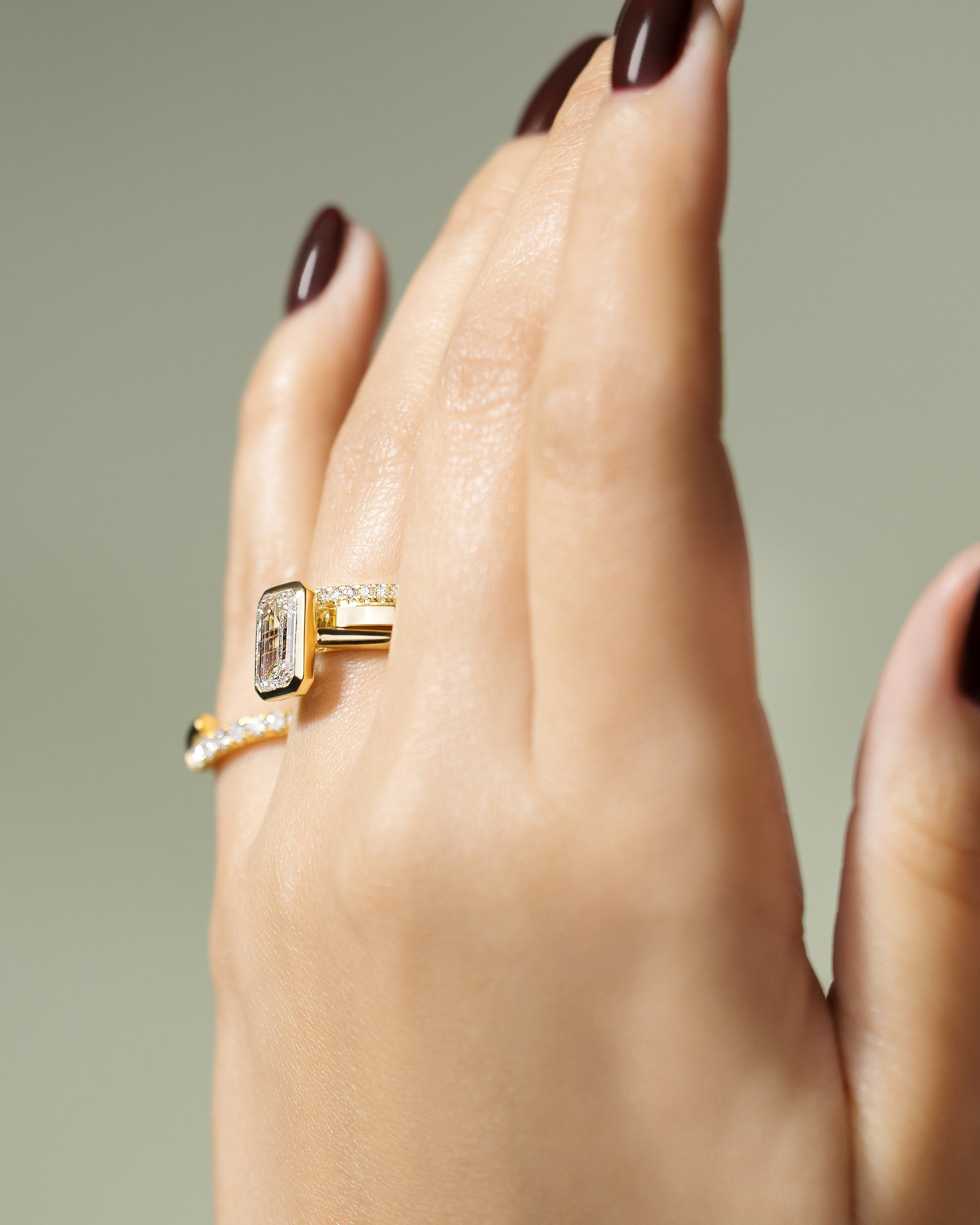 Journee - Bezel Set Emerald Solitaire Lifestyle Image