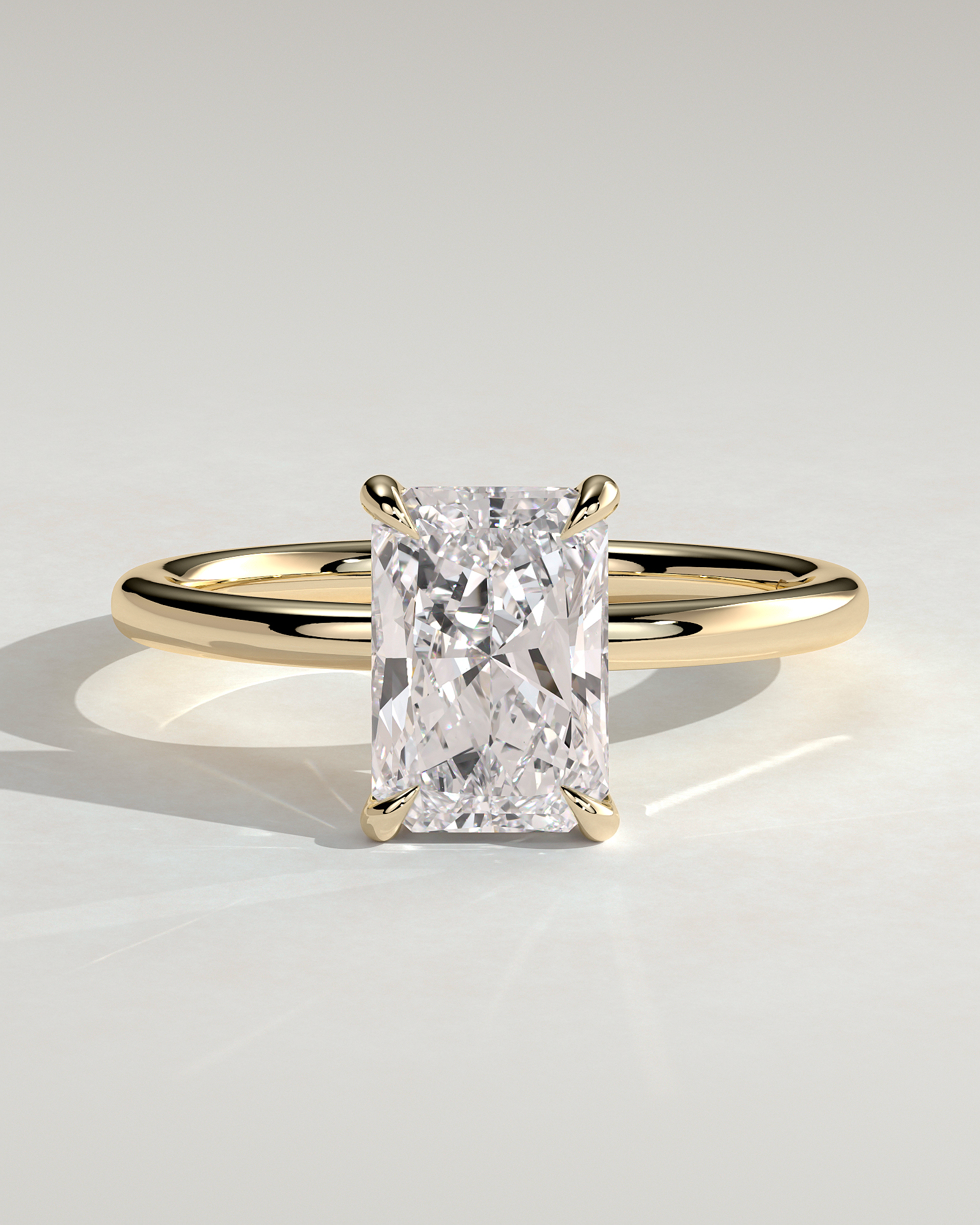 Judy - Radiant Solitaire - 18k Yellow Gold High Setting
