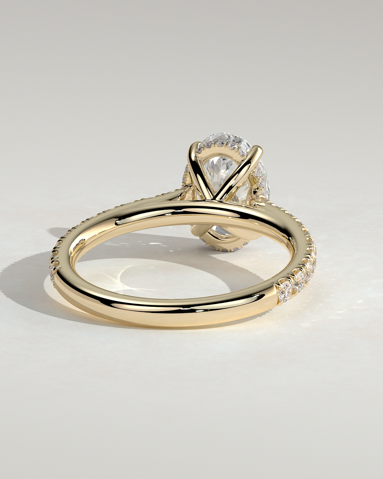 Julia  Oval Solitaire with Hidden Halo and Pav - 18k Yellow Gold