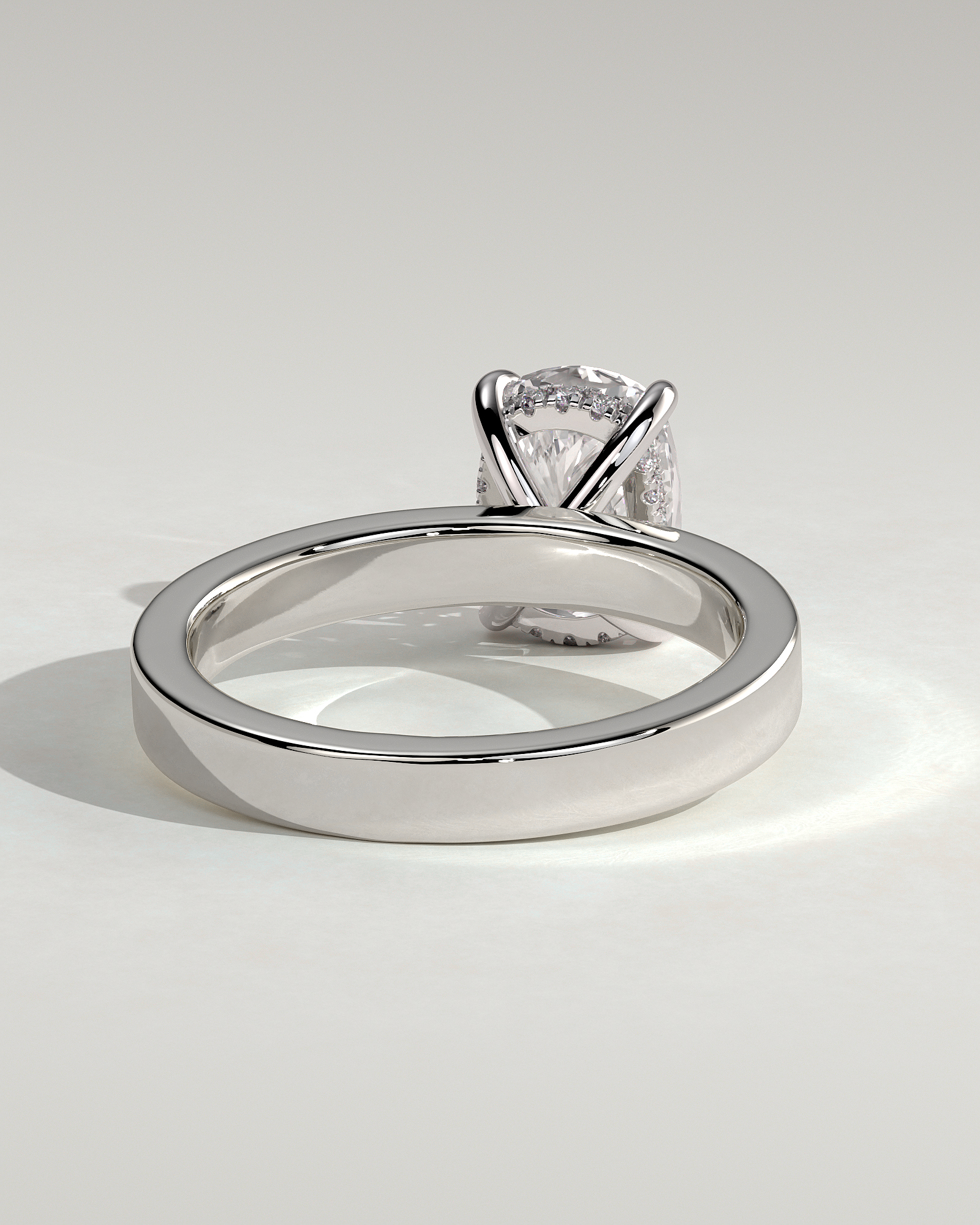 Kai - Elongated Cushion 4 Claw Solitaire with Flat Cigar Band and Hidden Halo Engagement Ring - 18k White Gold High Setting