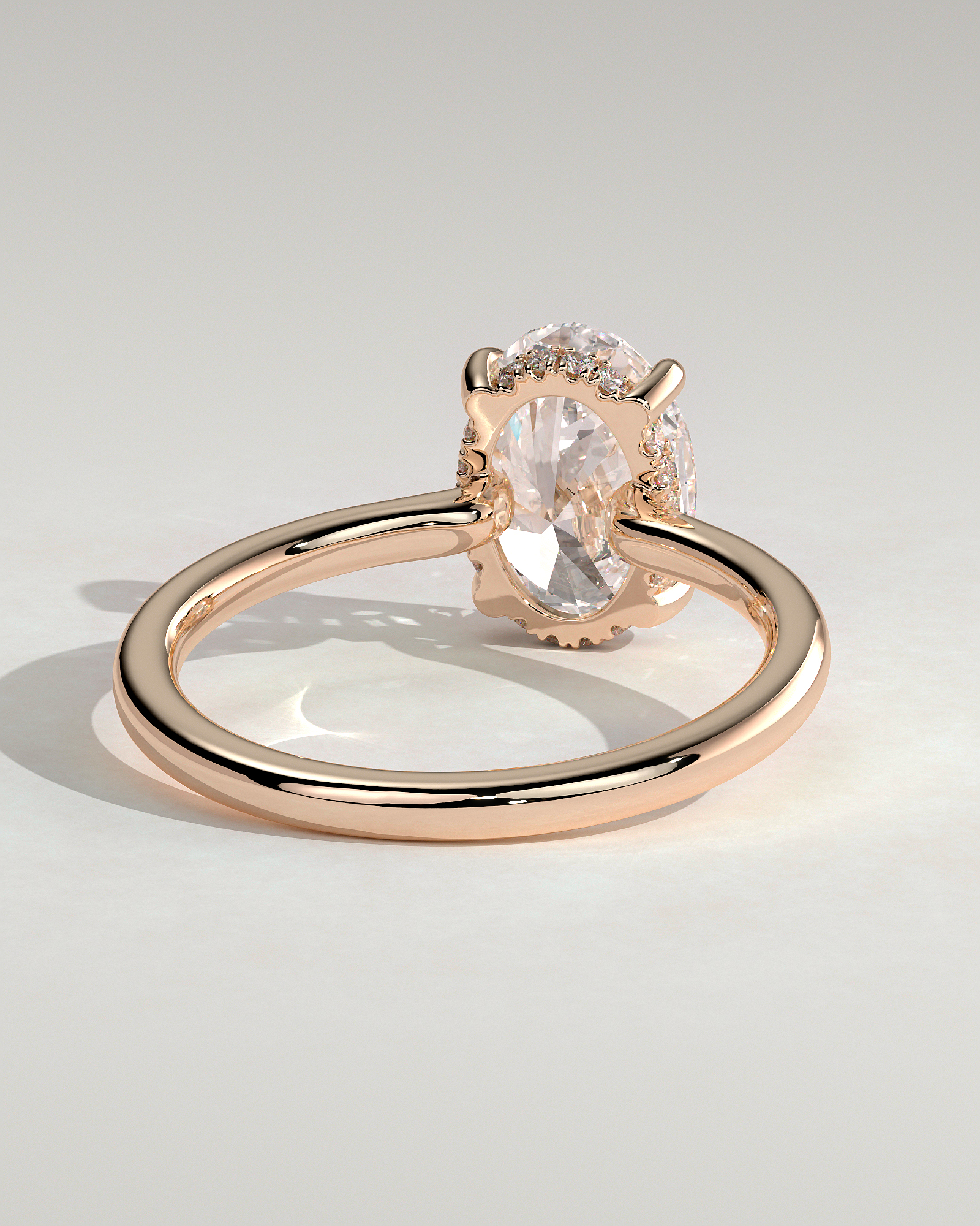 Kiana - Oval Floating Low Set Flush Solitaire with Hidden Halo - 18k Rose Gold