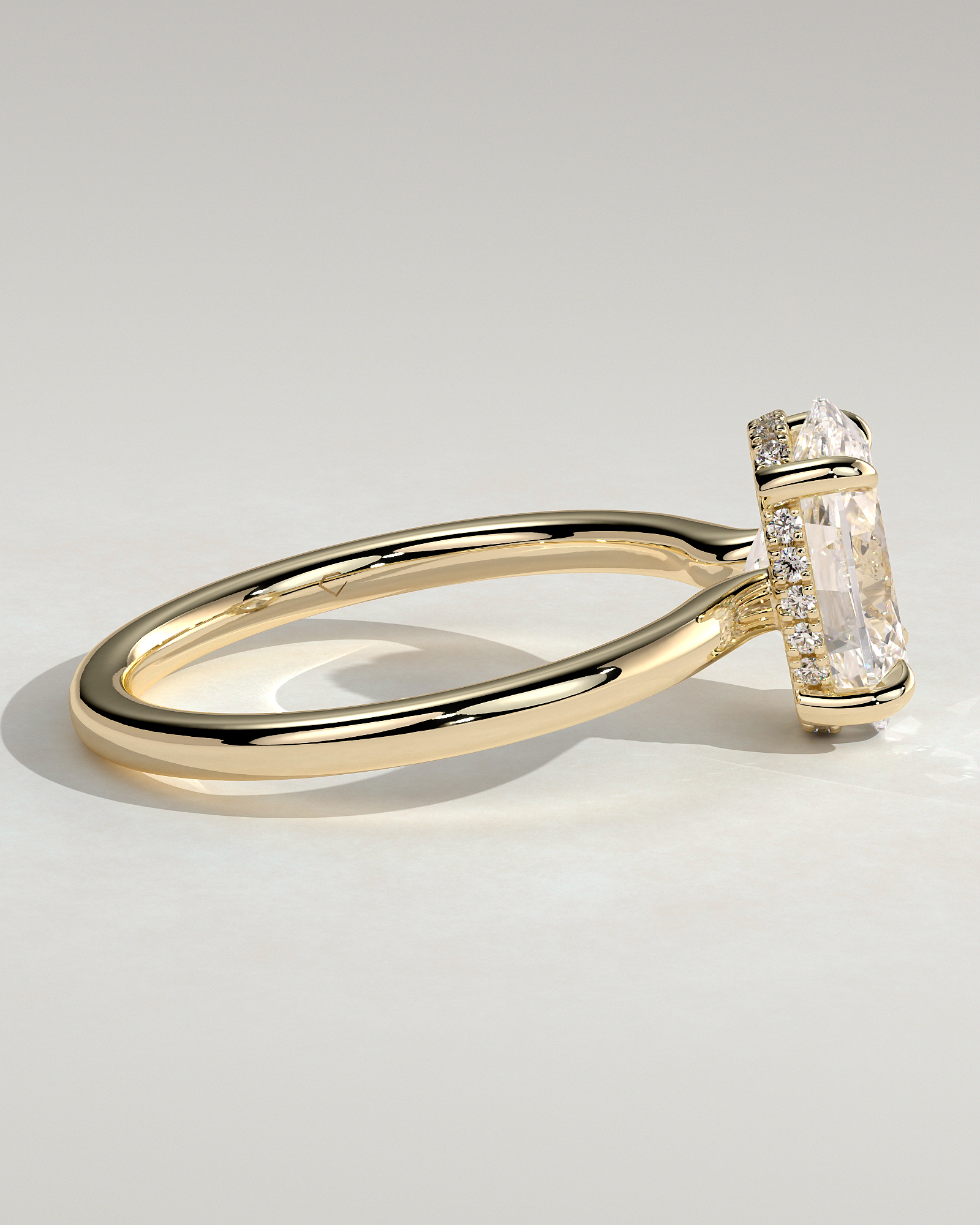Kiana - Oval Floating Low Set Flush Solitaire with Hidden Halo - 18k Yellow Gold