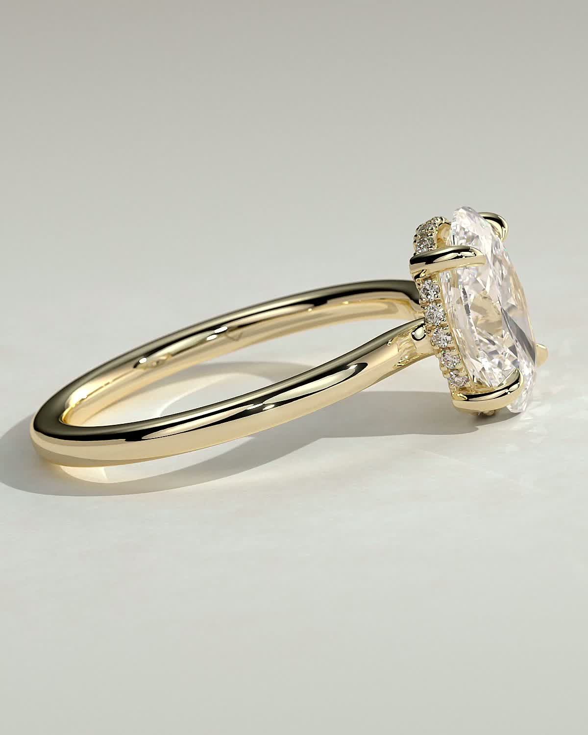 Kiana - Oval Floating Low Set Flush Solitaire with Hidden Halo - 18k Yellow Gold