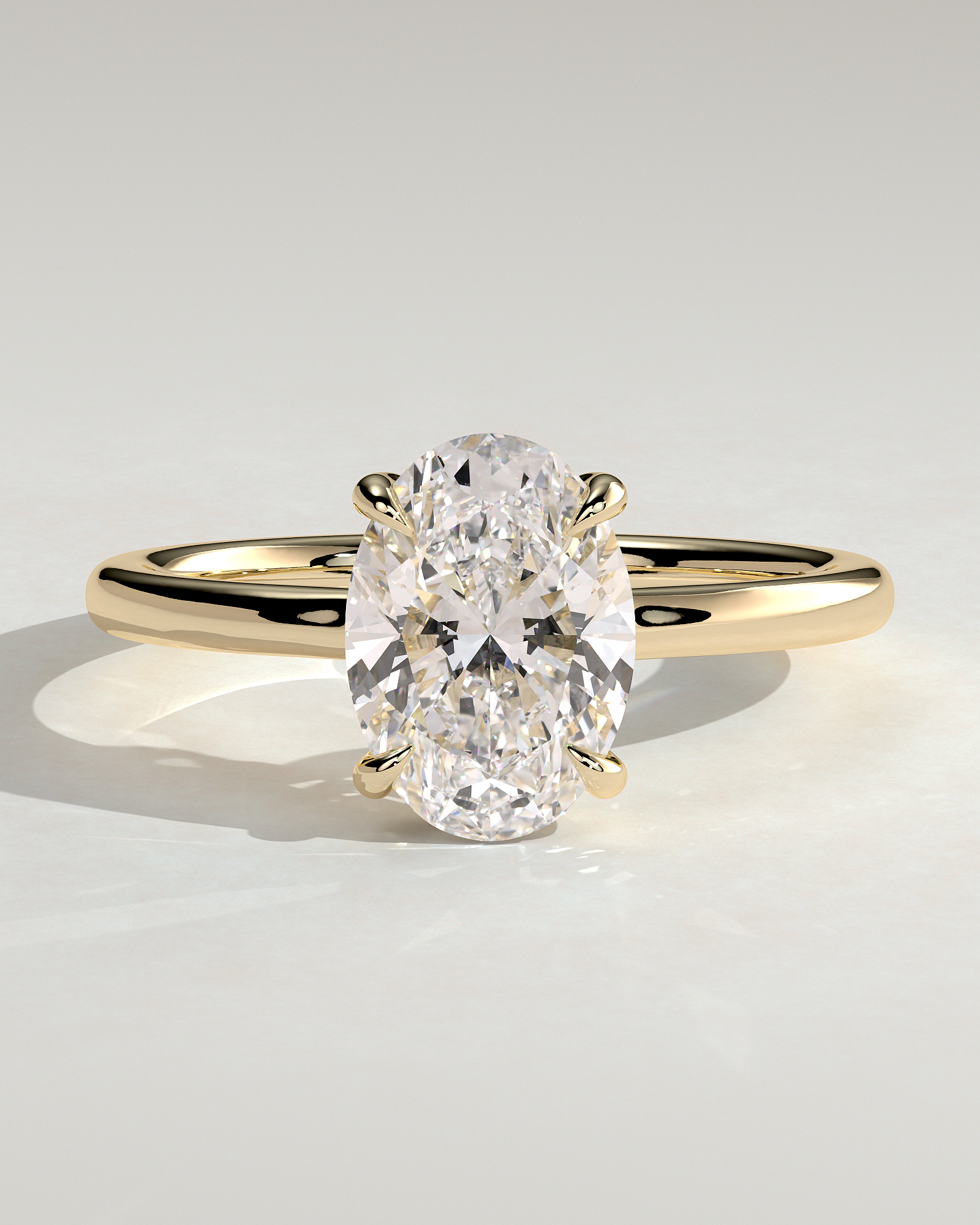 Kiana - Oval Floating Low Set Flush Solitaire with Hidden Halo - 18k Yellow Gold