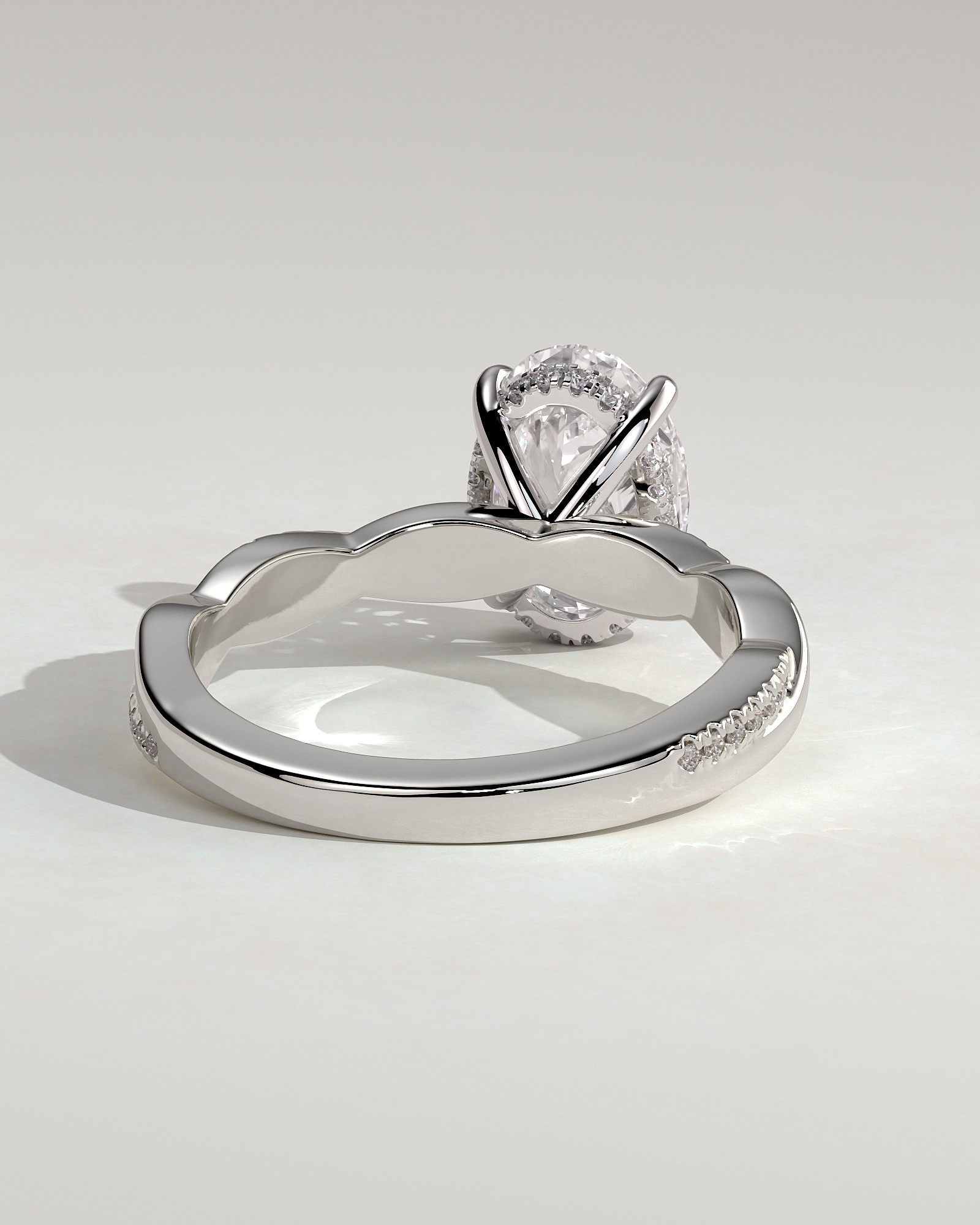 Lara - Oval Solitaire with Twisted Pav Band - 18k White Gold