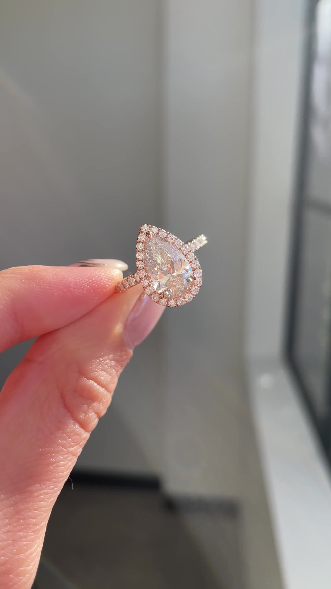 Lauren - Pear Halo with Pav Set Lifestyle Image