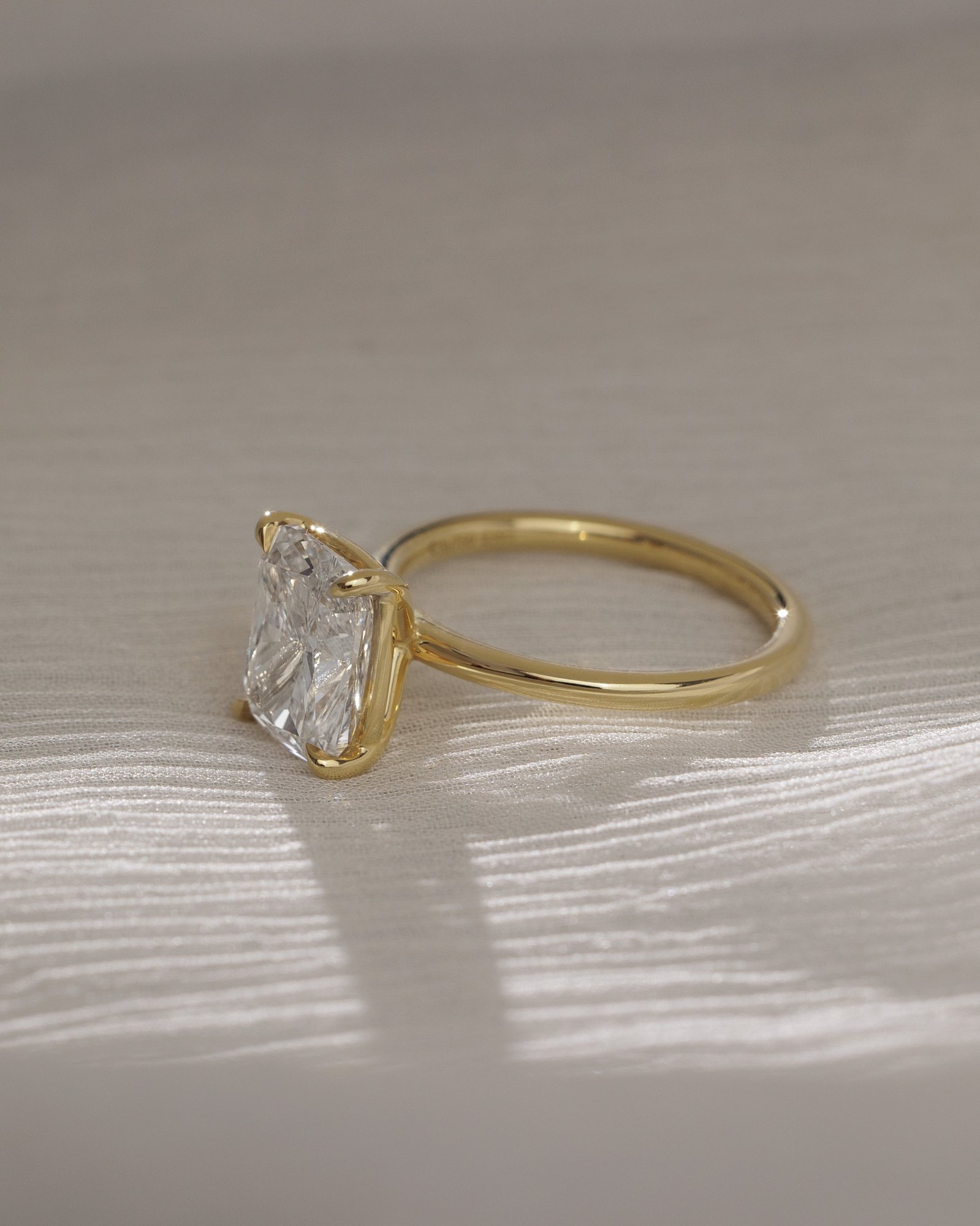 Leonora - Elongated Cushion Solitaire Lifestyle Image