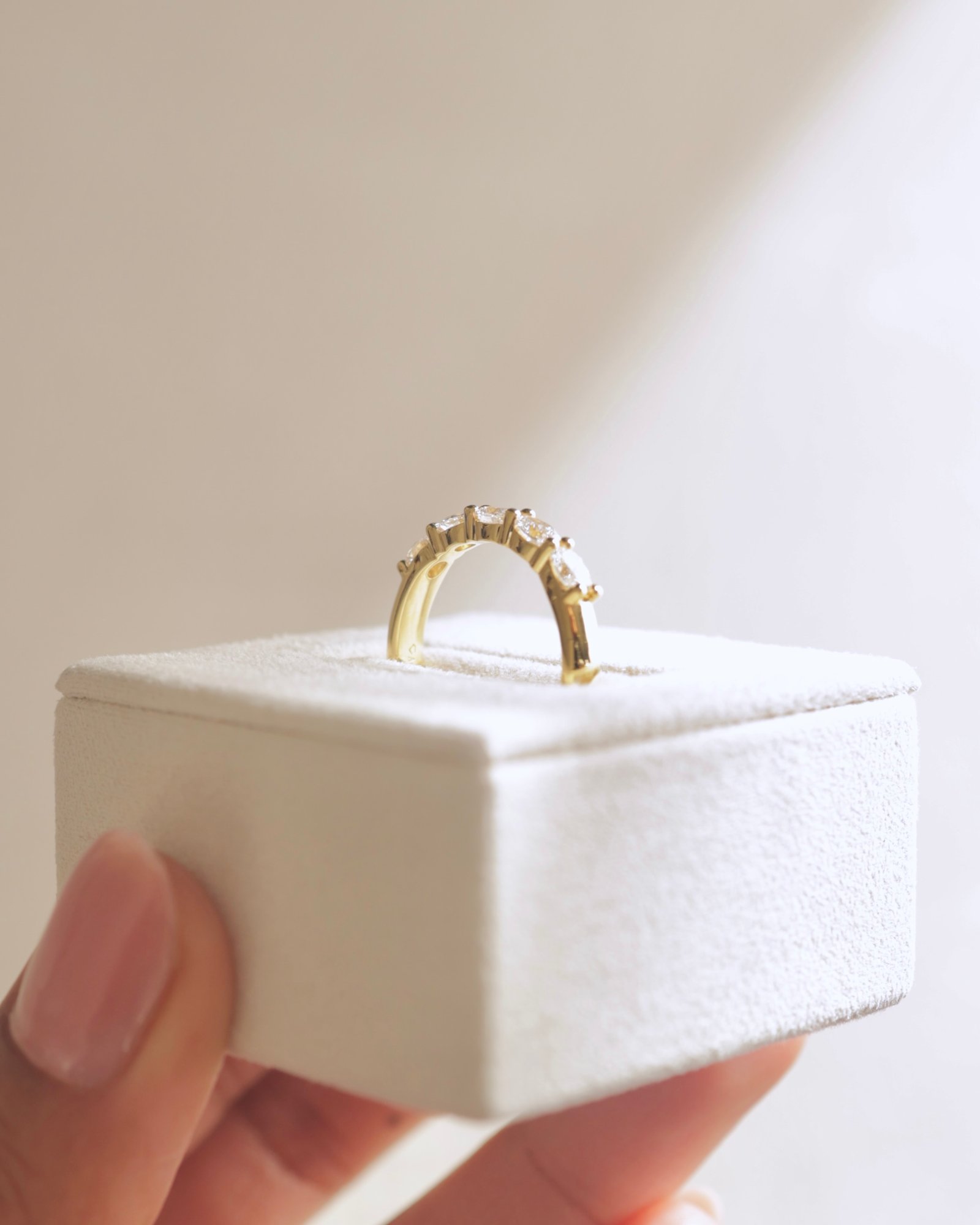 Levi - 5 Stone East West Oval Wedding Band Lifestyle Image